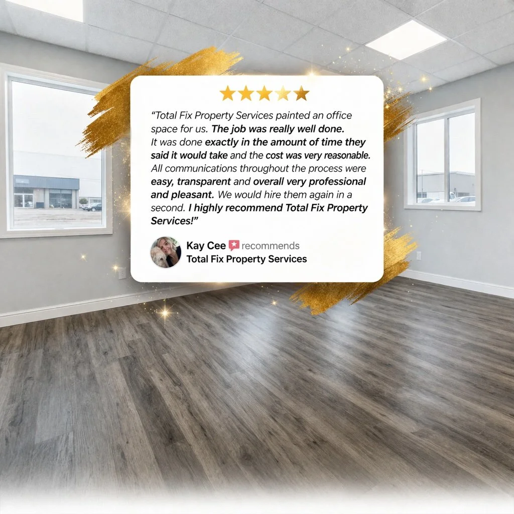 A review overlay on a photo of an empty office room with large windows, a gray wall, and wood flooring. The review is a five-star rating praising Total Fix Property Services for painting an office space professionally, efficiently, and transparently. It recommends their services, compliments their communication, and includes a profile picture of a woman named Kay Cee who recommends the service.