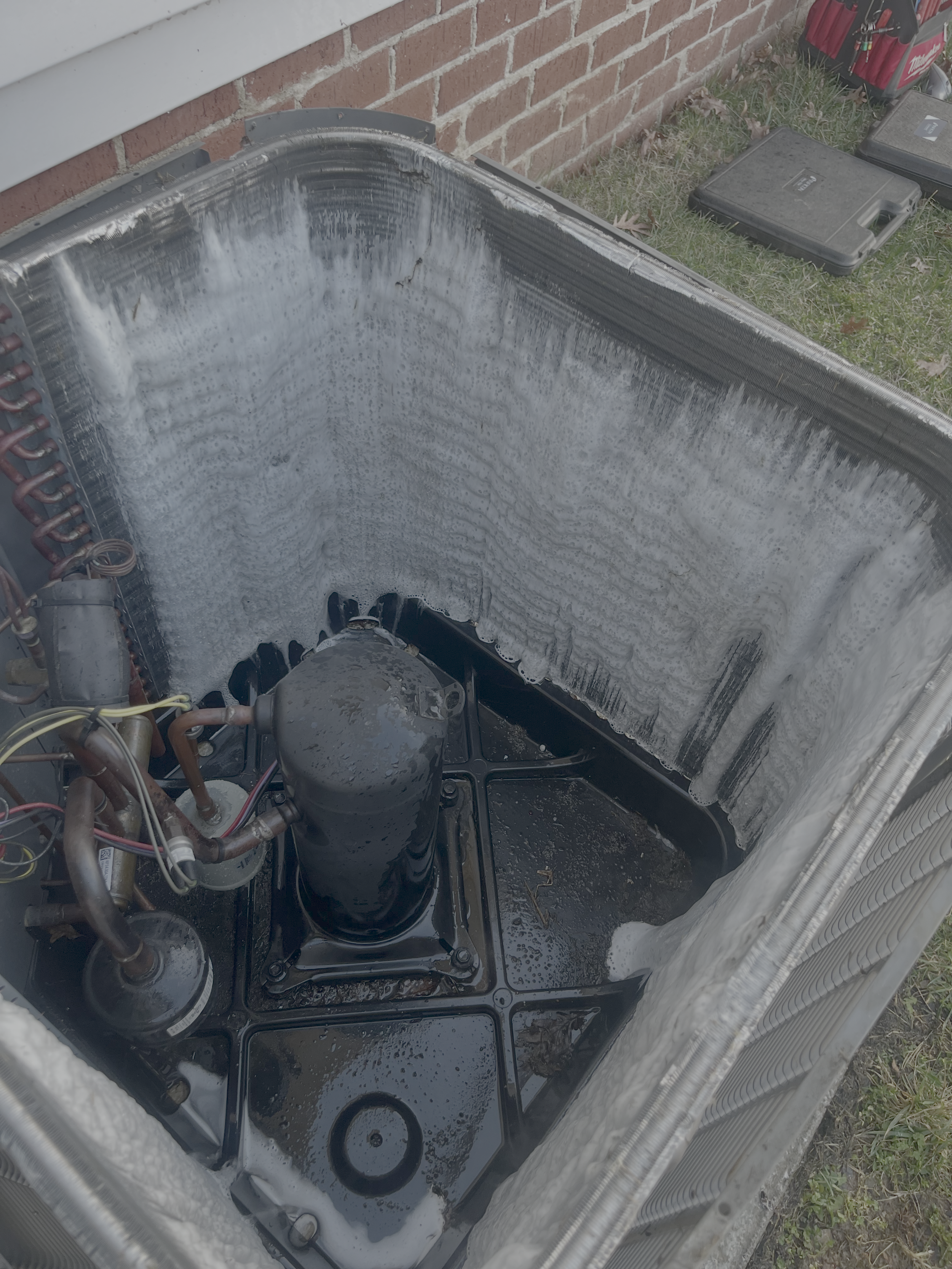HVAC condenser coil cleaning during preventive maintenance service to improve airflow, energy efficiency, and system reliability