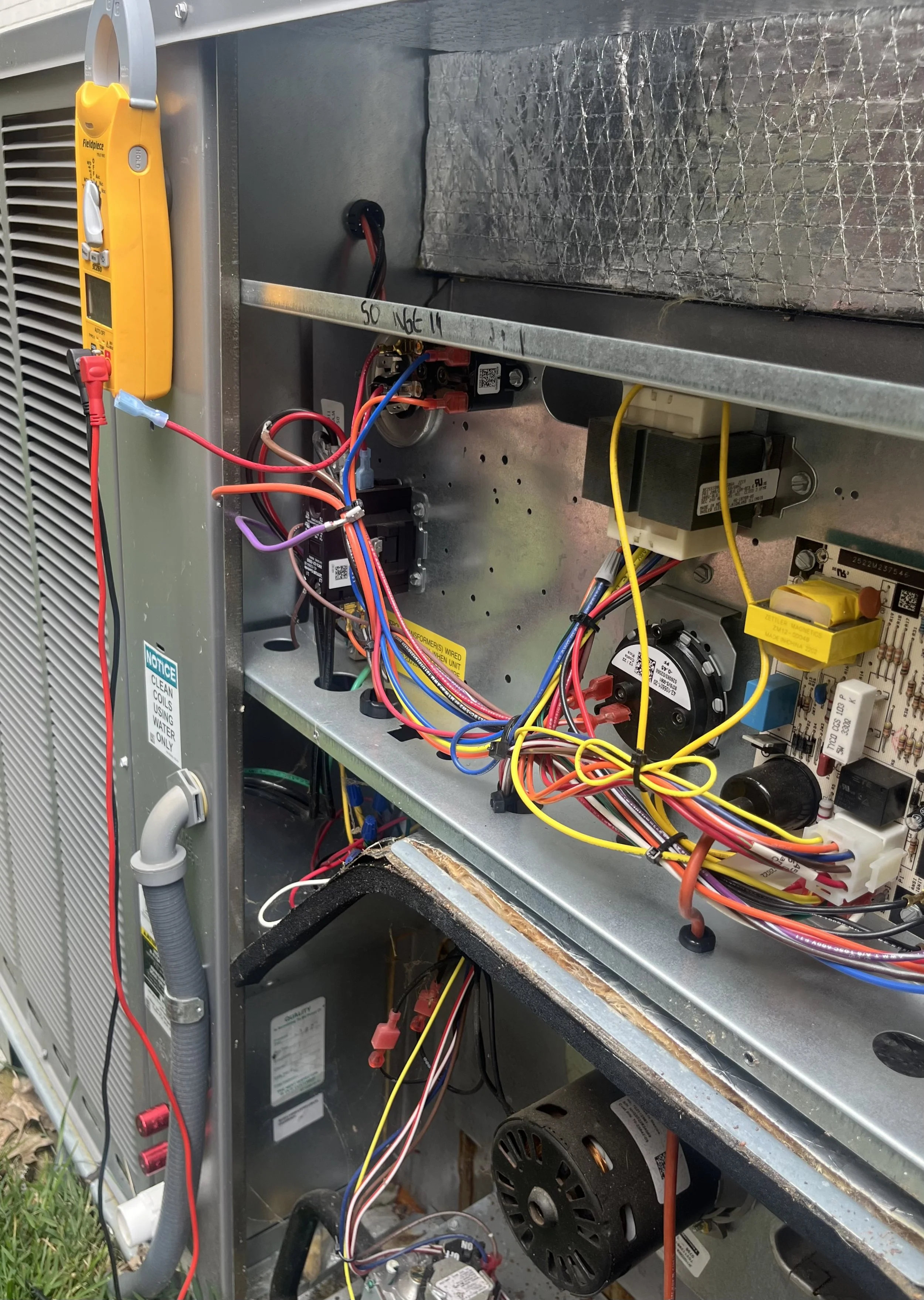 HVAC electrical diagnostics and control board troubleshooting during residential heating and cooling system preventative maintenance service