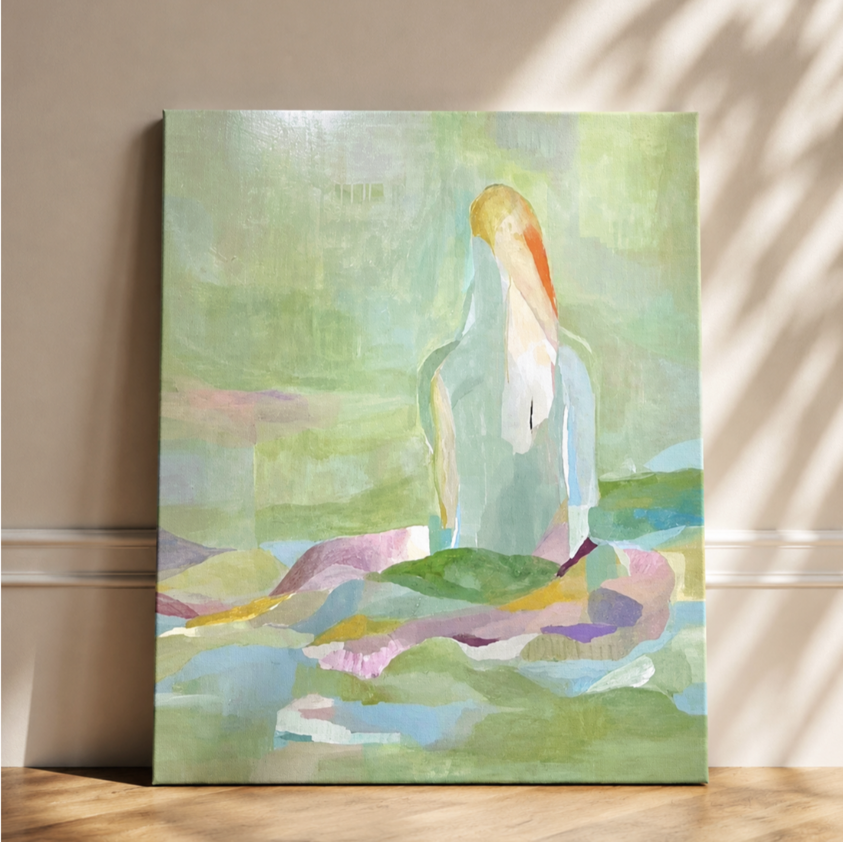 A colorful abstract painting depicting a person sitting on rocks by a body of water with a lake and trees in the background.