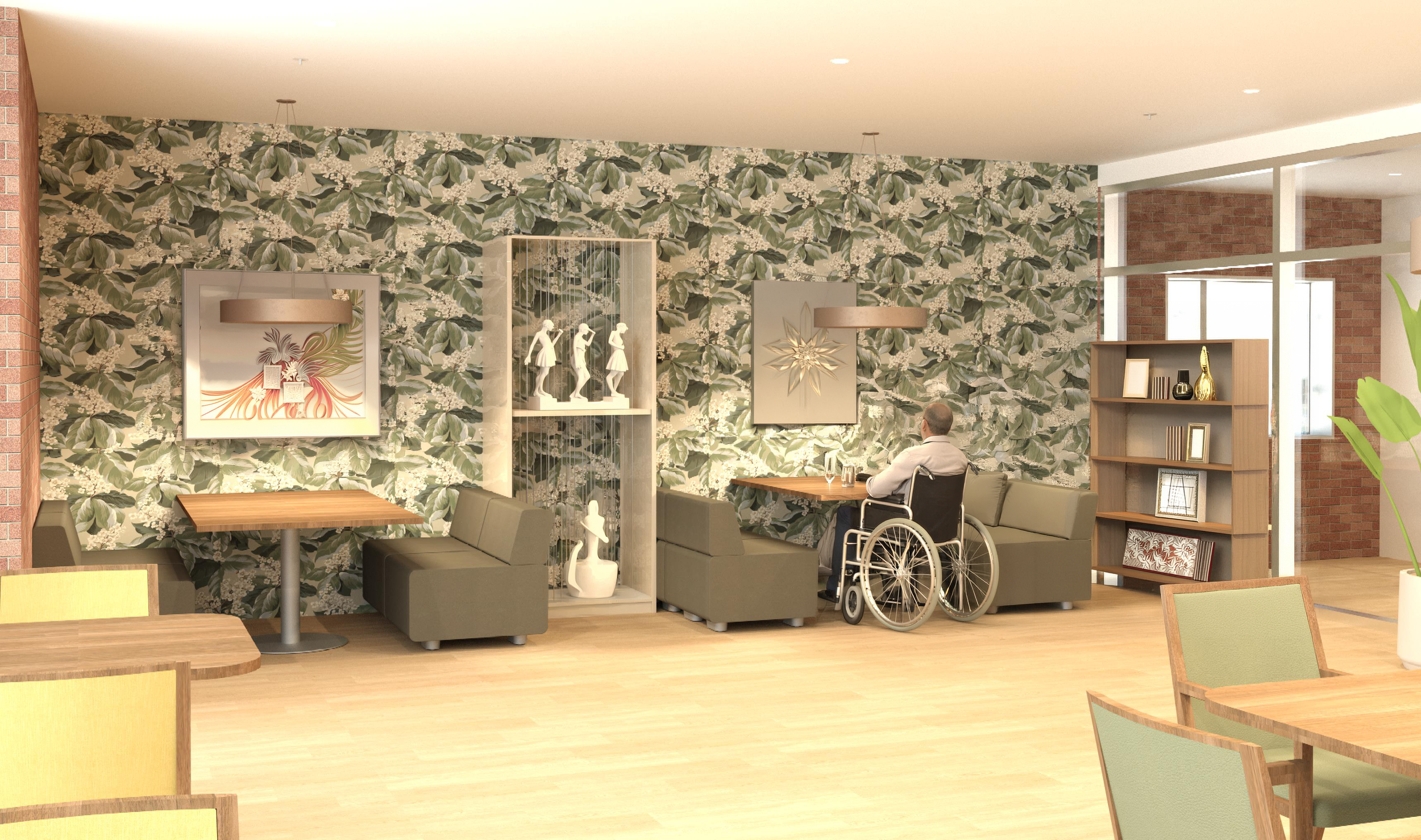 Interior view of a room with a leafy floral wallpaper, modern art on the walls, and a person in a wheelchair sitting on a sofa. There are tables, chairs, and a wooden bookshelf with decorative items and books in the space.