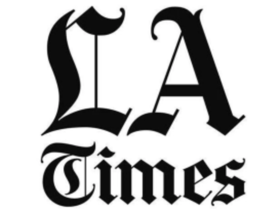 Stylized black text spelling 'LA Times' with Gothic font.
