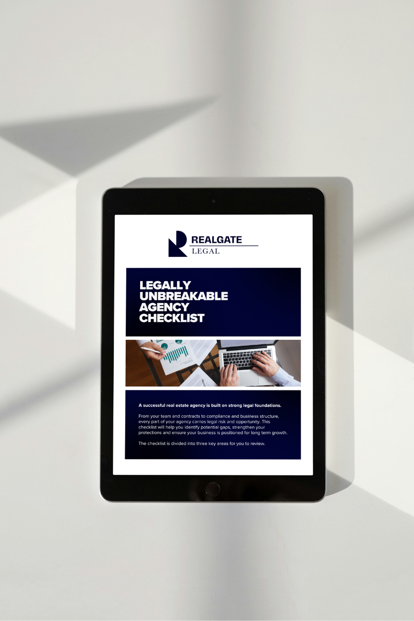 Tablet displaying a legal checklist for real estate agencies, with the title 'Legally Unbreakable Agency Checklist' and an image of hands working with charts and a laptop.