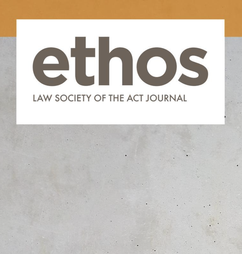 Cover of Ethos, a journal by the Law Society of the ACT, with a minimalist design featuring a white background and a gray concrete-like texture, with a band of brown and gray at the top.