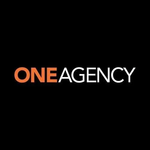 Logo featuring the text 'ONE AGENCY' with 'ONE' in orange and 'AGENCY' in white on a black background.