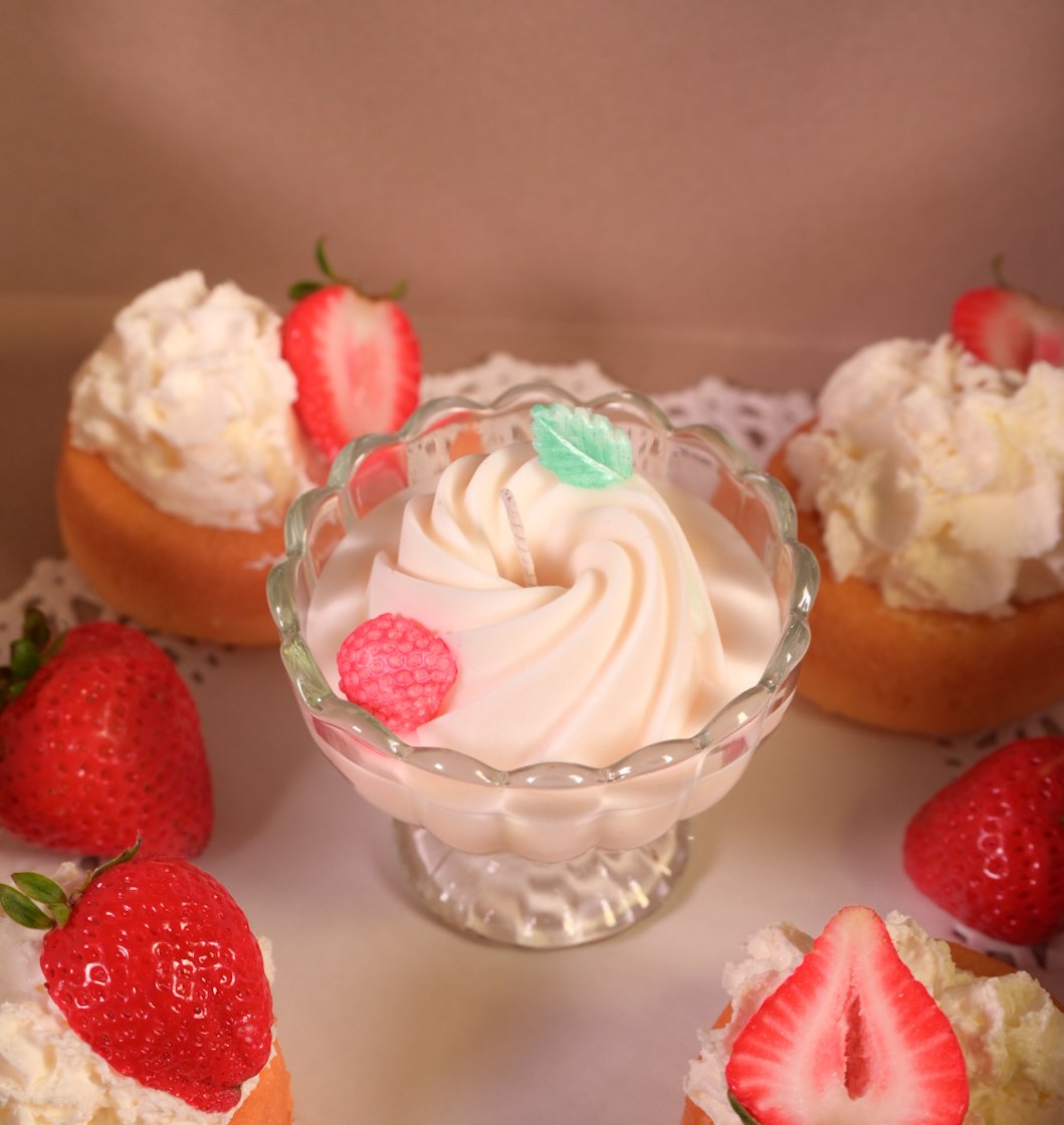 Ignis Knosis Strawberry Cheesecake candle inspired by fresh strawberries, vanilla cream, and bakery notes, handcrafted artisan candle from the Curious Confections collection.
