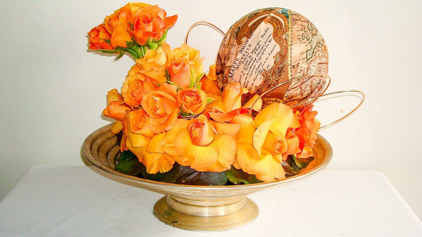 Grammy Table Arrangement Orange Roses.jpg