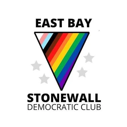 The image features a triangle with a rainbow stripe pattern, surrounded by four gray stars. Above the triangle, it says 'EAST BAY,' and below, it says 'STONEWALL DEMOCRATIC CLUB' in bold and regular fonts.