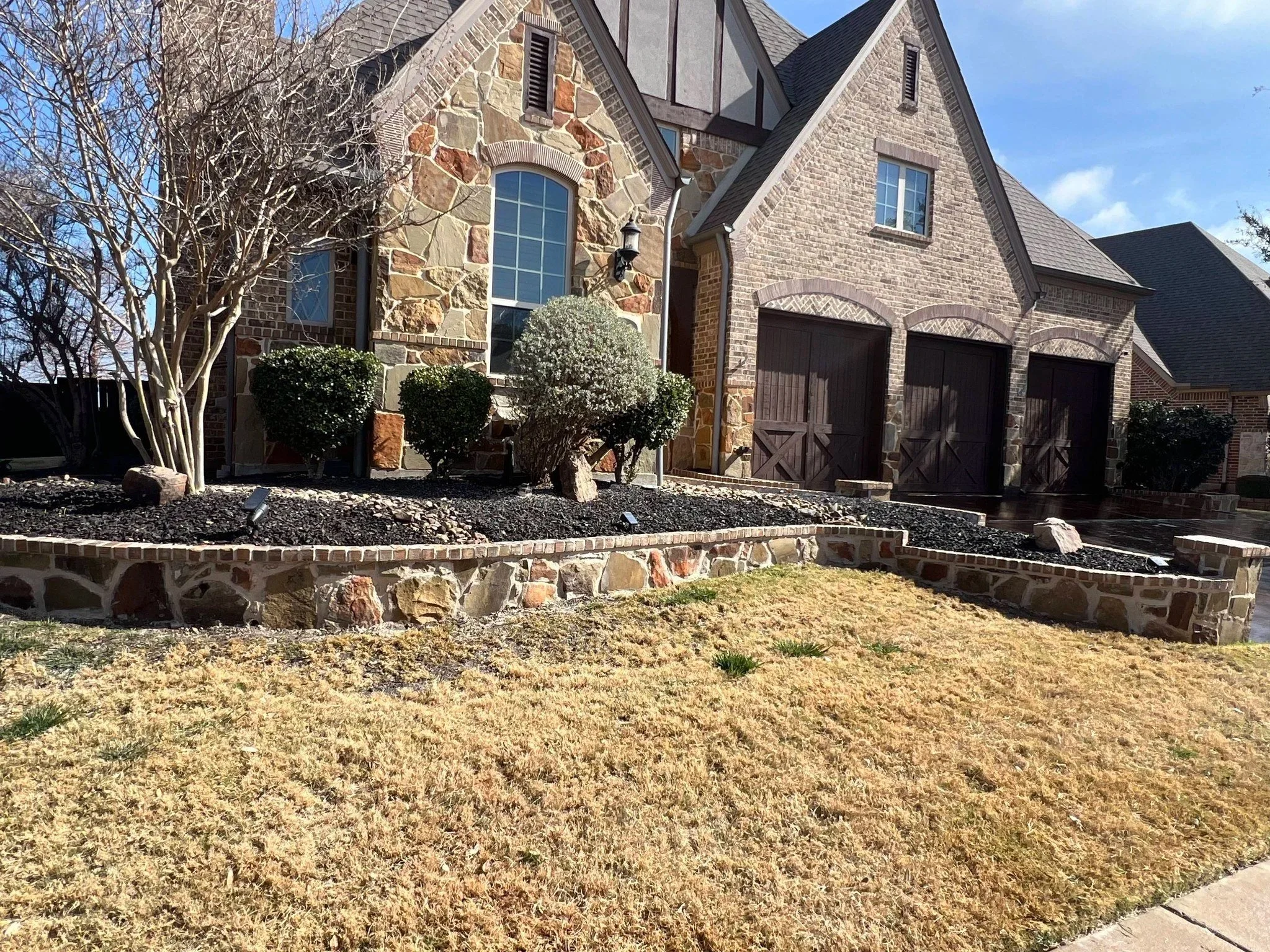 Landscaping and beautiful retaining wall