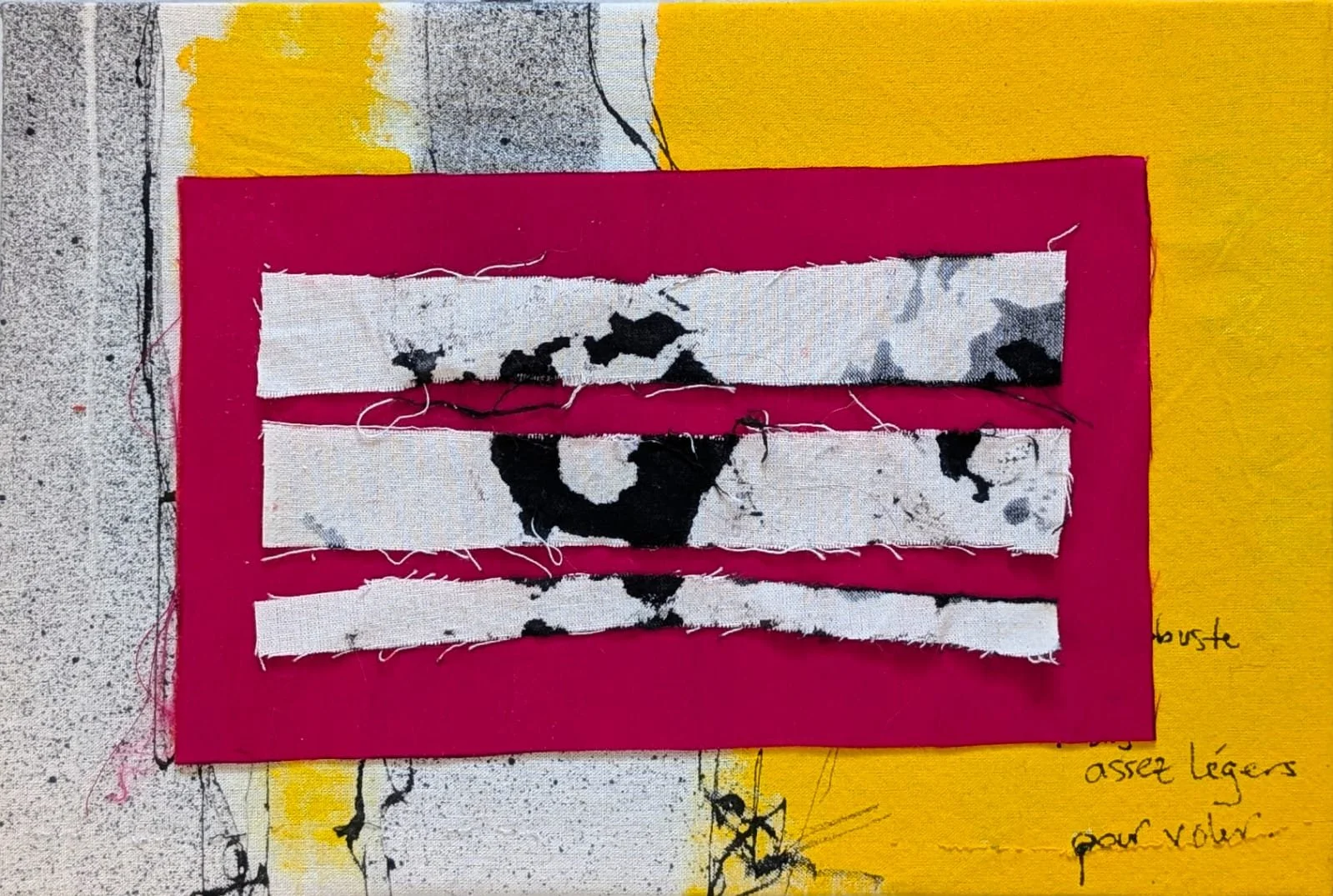 A very expressive and happy piece of art with torn fabric strips, black ink, deep pink background, and yellow-painted fabric with handwritten text.