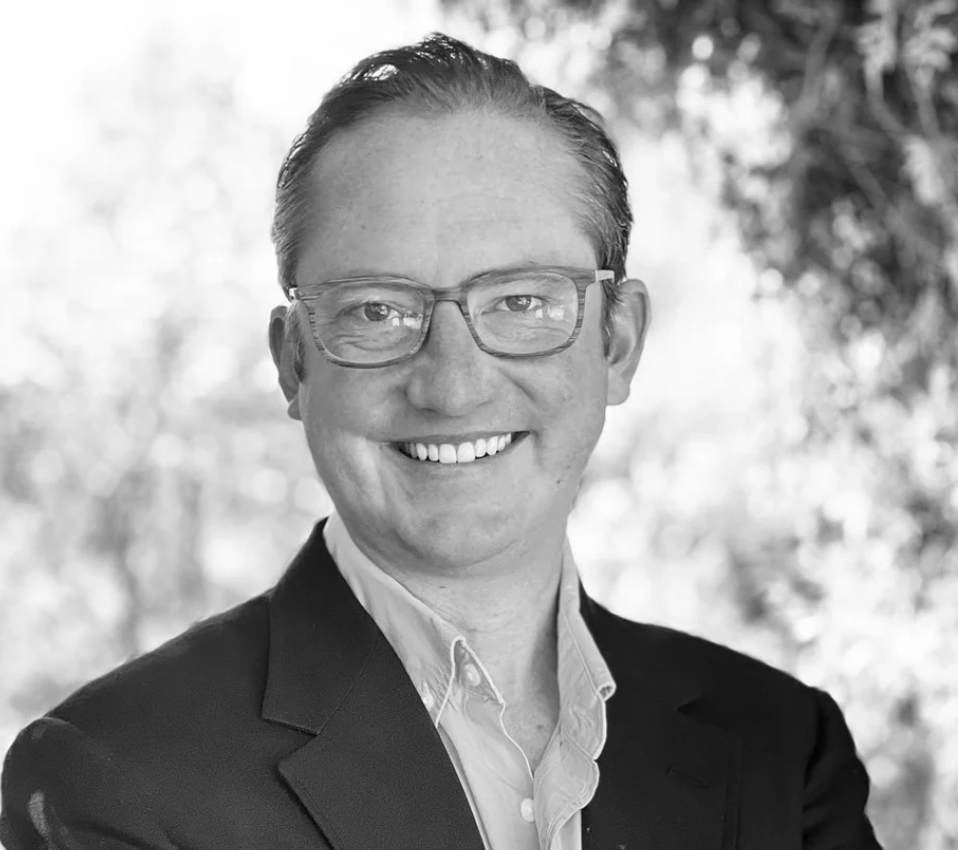 Black and white photo of Board of Trustees member, Peter Wright.