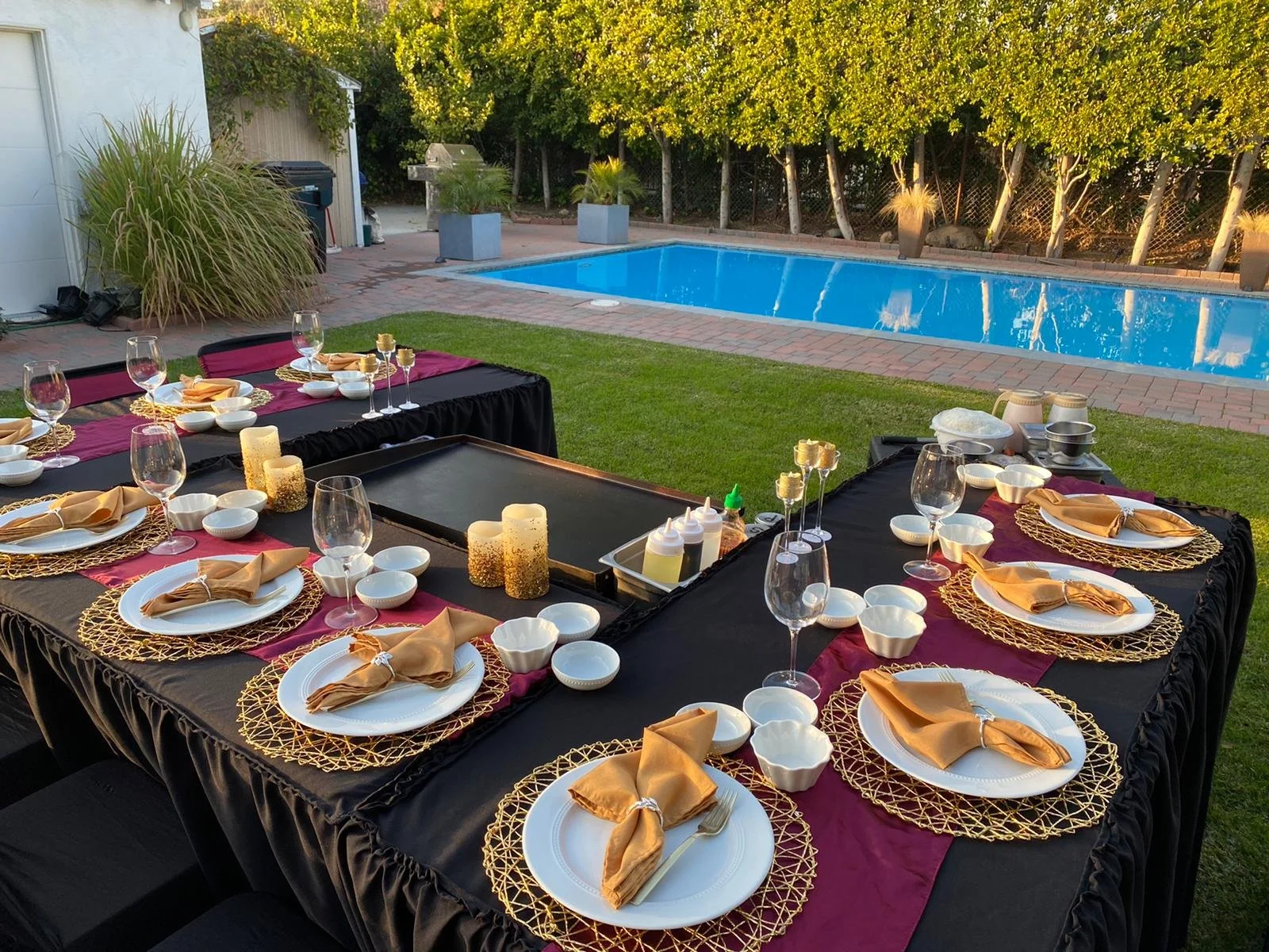 Exclusive Hibachi at Home poolside dinner party, offering high-end Hibachi Catering services for a Bachelorette Party or sophisticated Baby Shower.