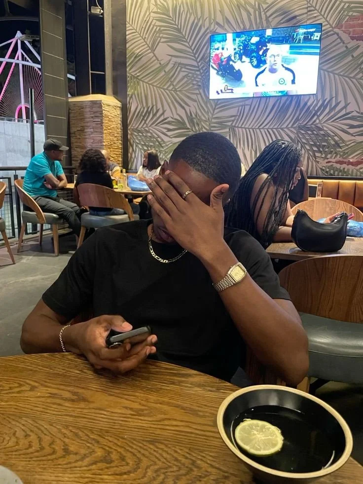 A man out on a date, present in the room instead of on his phone