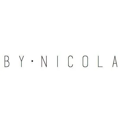 The word 'BY NICOLA' written in black uppercase letters on a white background.