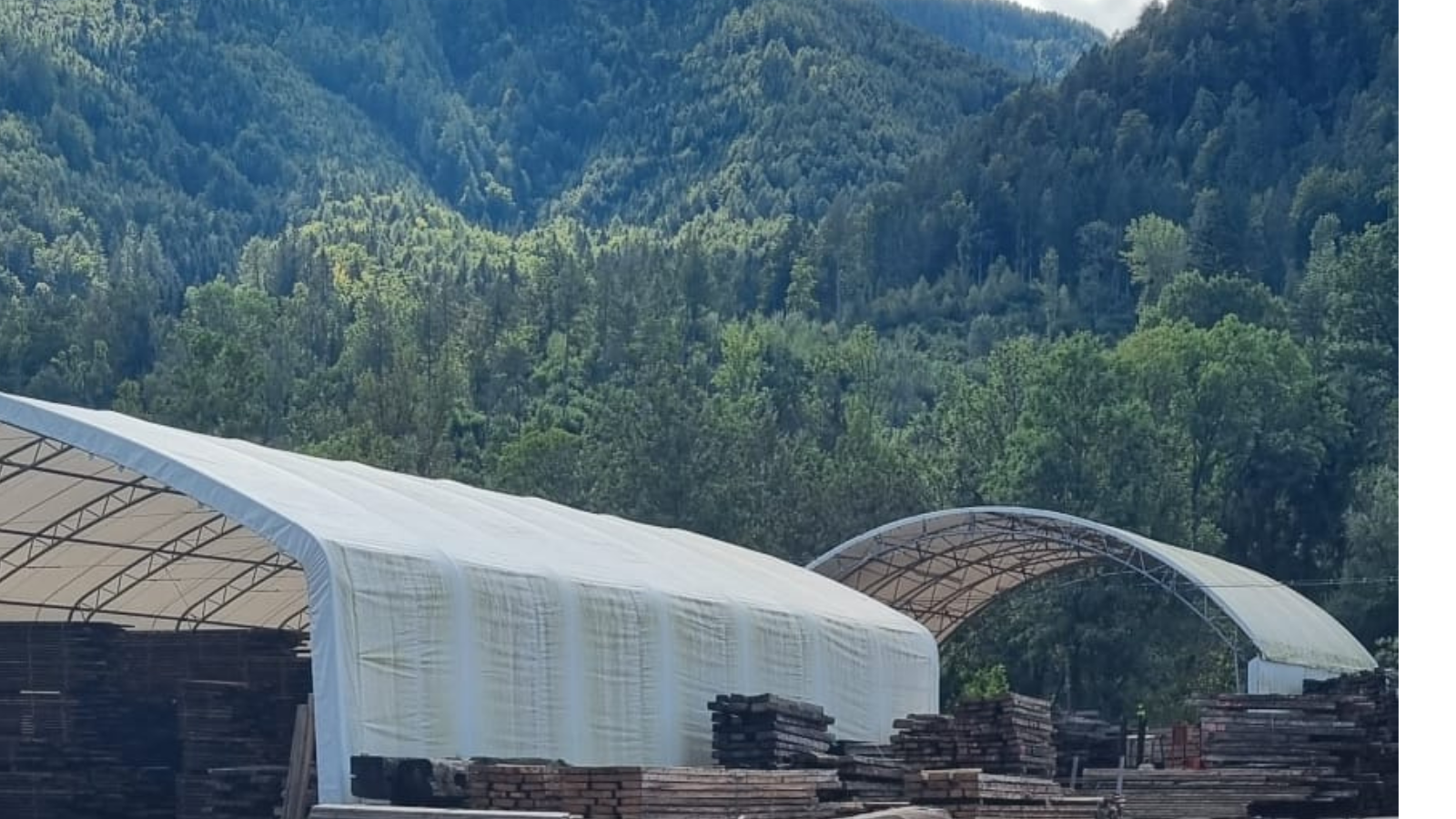 Reclaimed European oak stored at a timber yard in Europe.