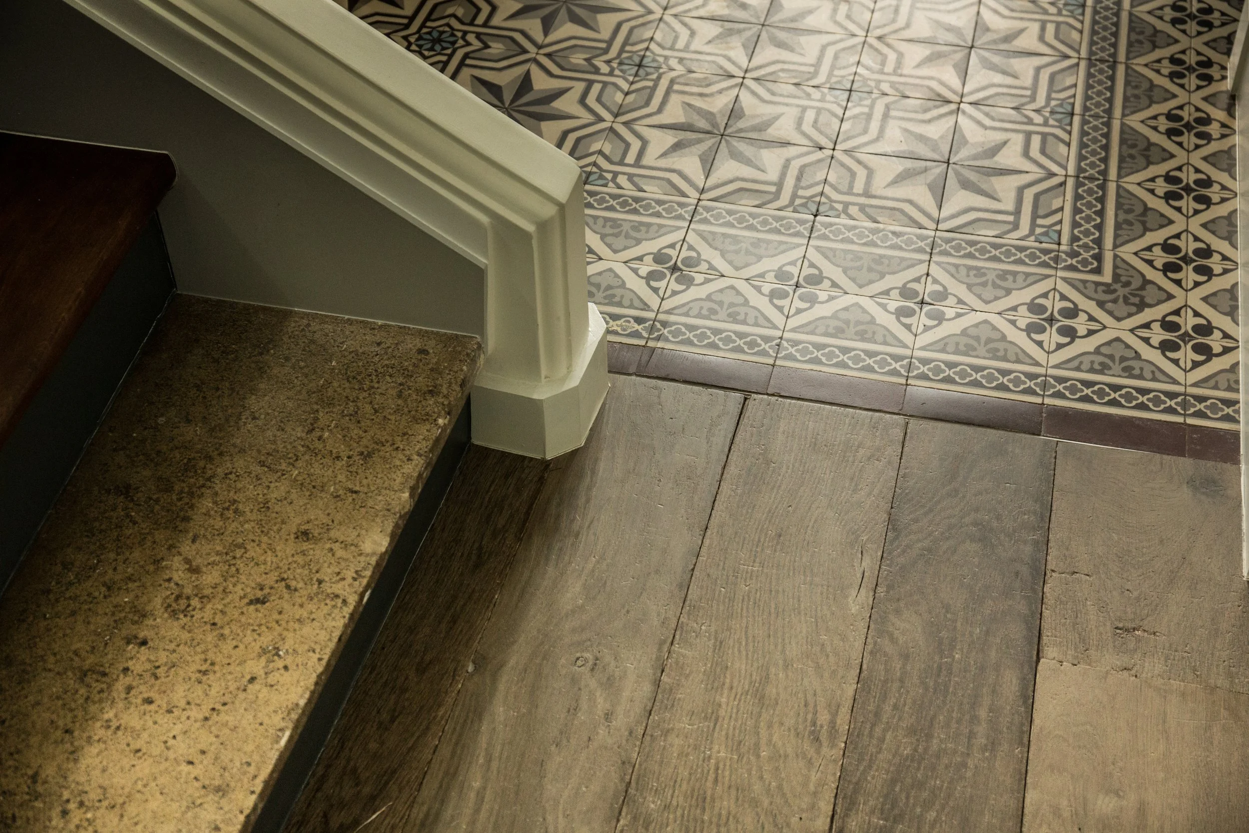 Antique oak flooring boards with rustic texture and aged character