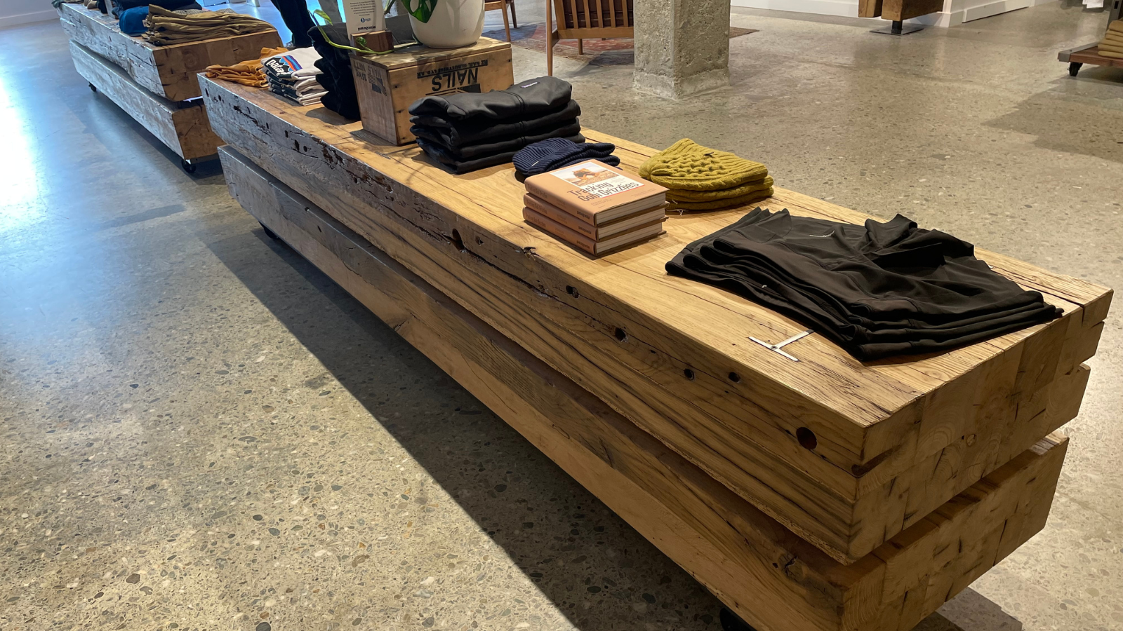 Reclaimed oak retail display bench made from antique European timber with natural grain, knots and aged character.
