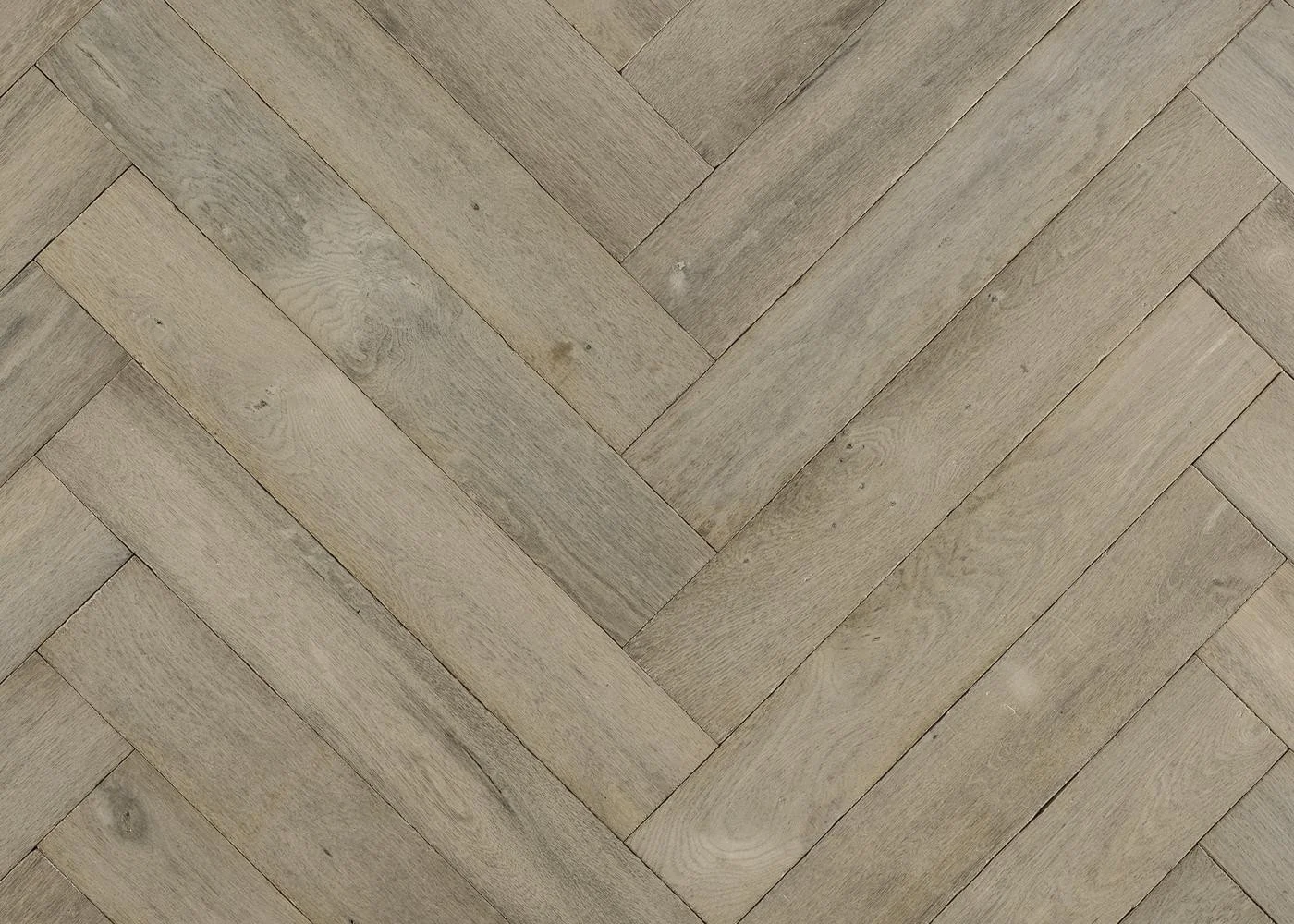 Reclaimed oak herringbone floor with rustic texture
