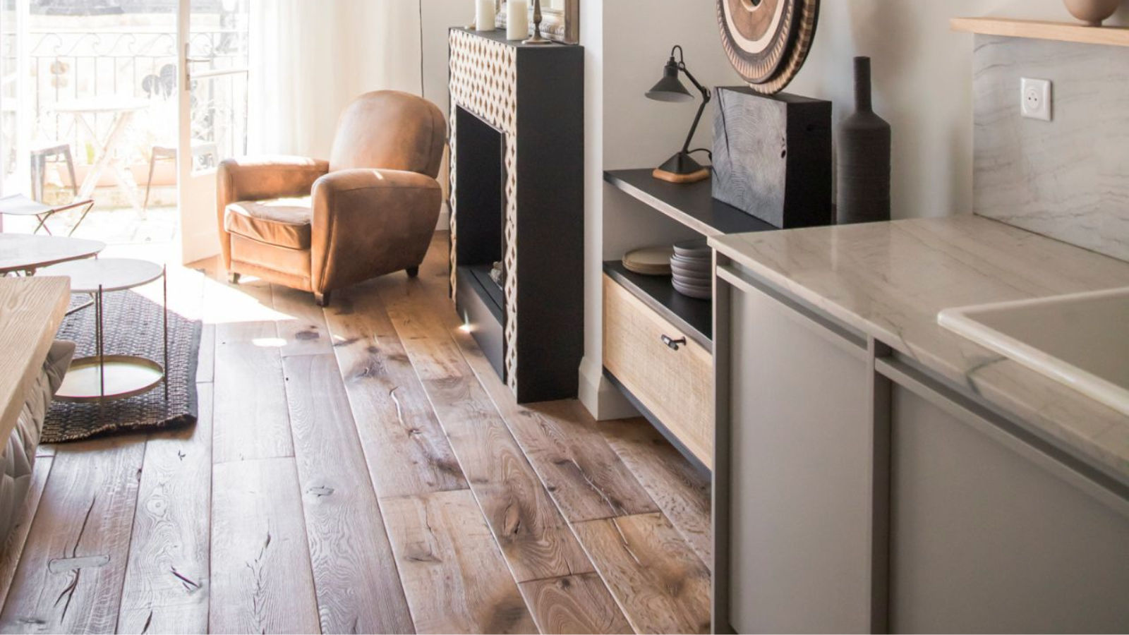 Vintage French oak flooring in a kitchen and living interior, showing warm natural grain, knots and character.