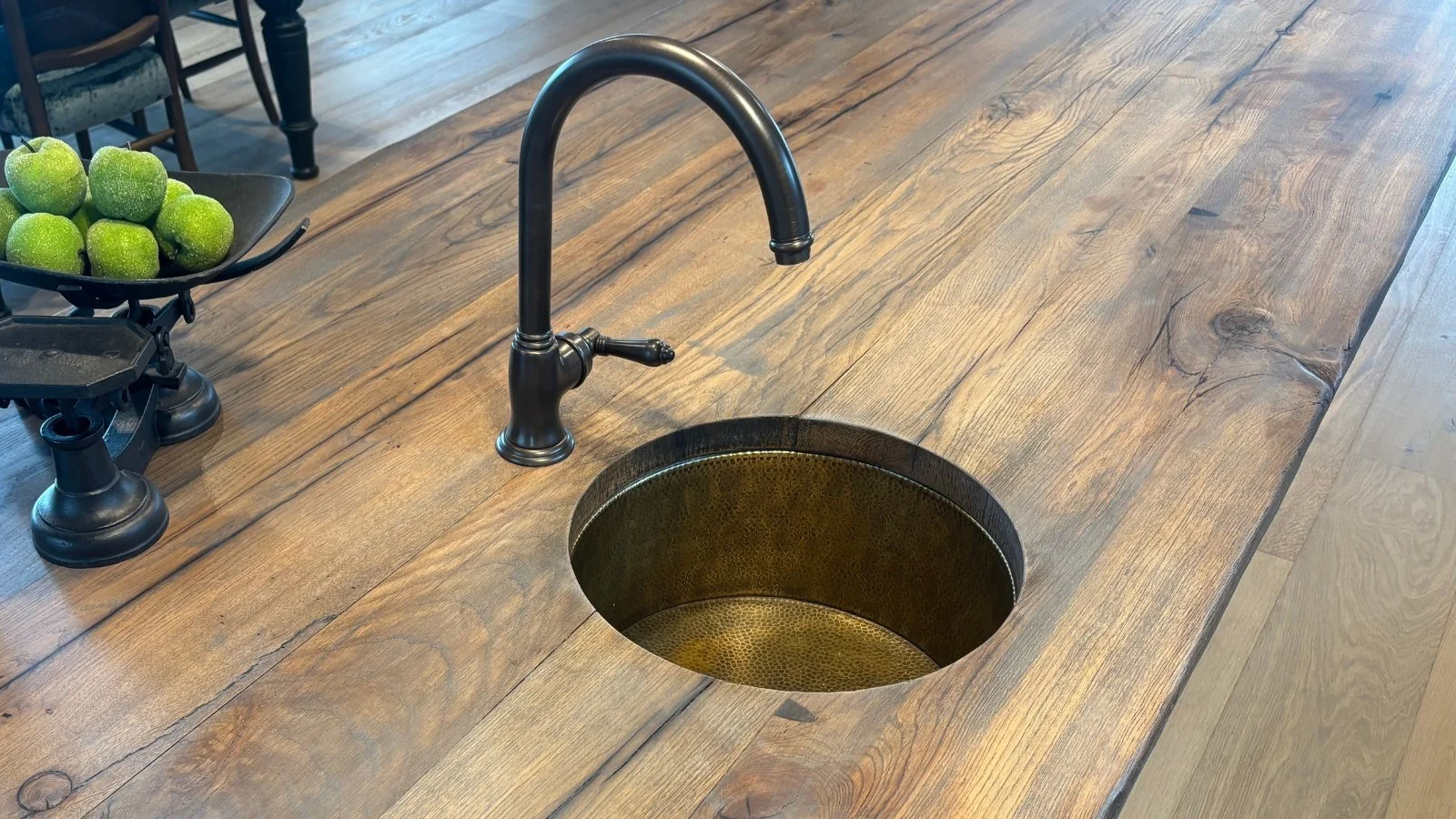 Reclaimed European oak kitchen benchtop showing aged grain, natural character and custom sink detail.