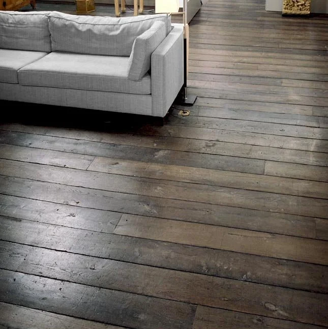 Rustic oak flooring with natural grain in a contemporary room. barn wood flooring