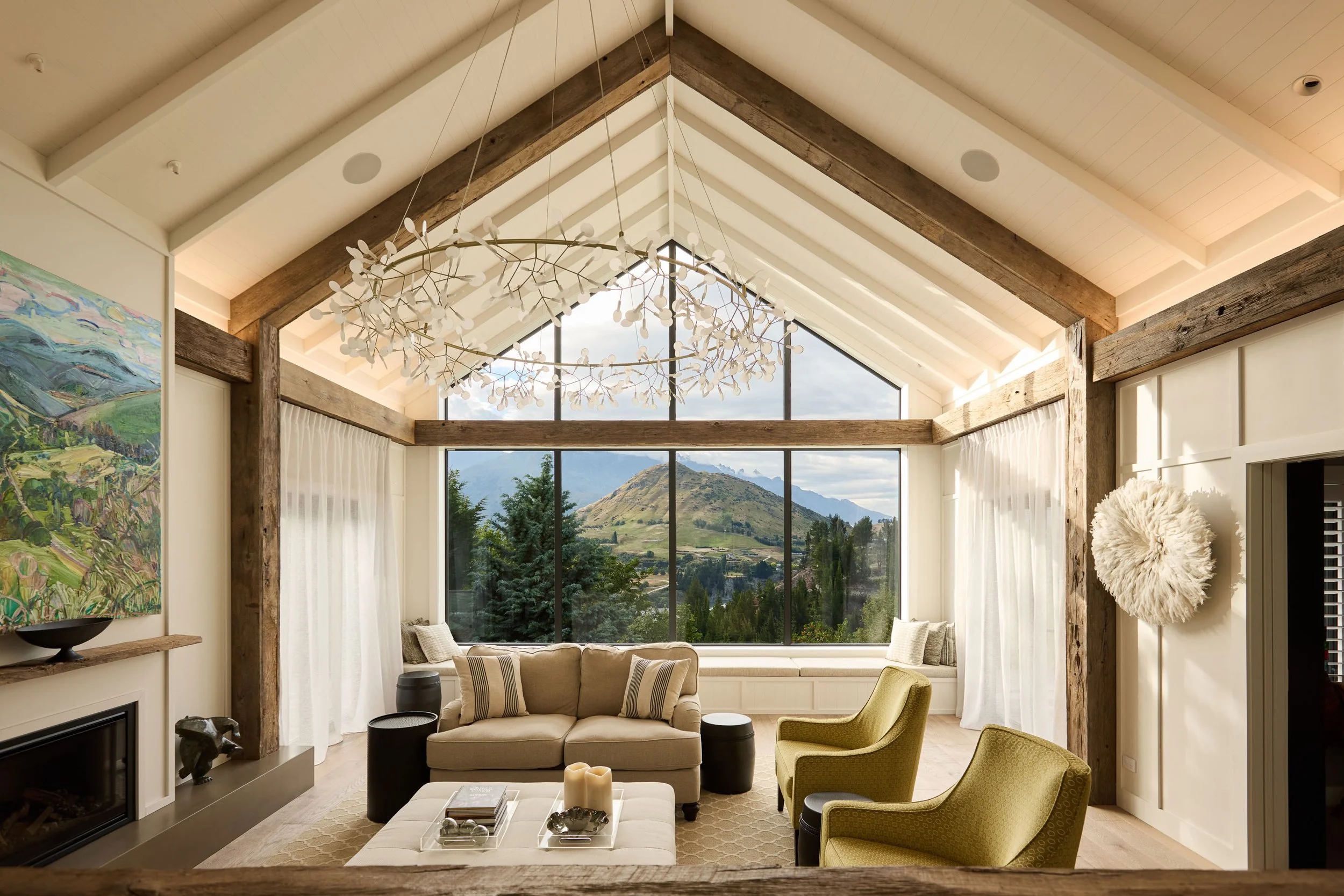 Living room with rustic modern wooden trusses made of reclaimed oak