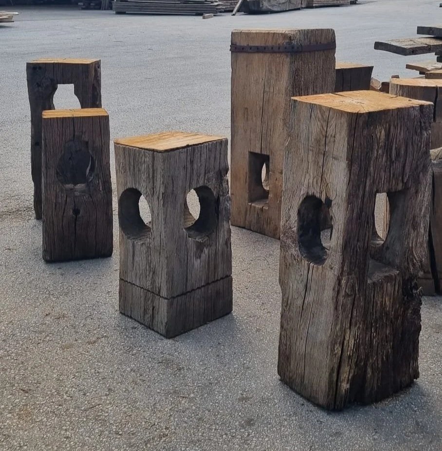 Oak weathered wooden blocks with circular holes cut out.