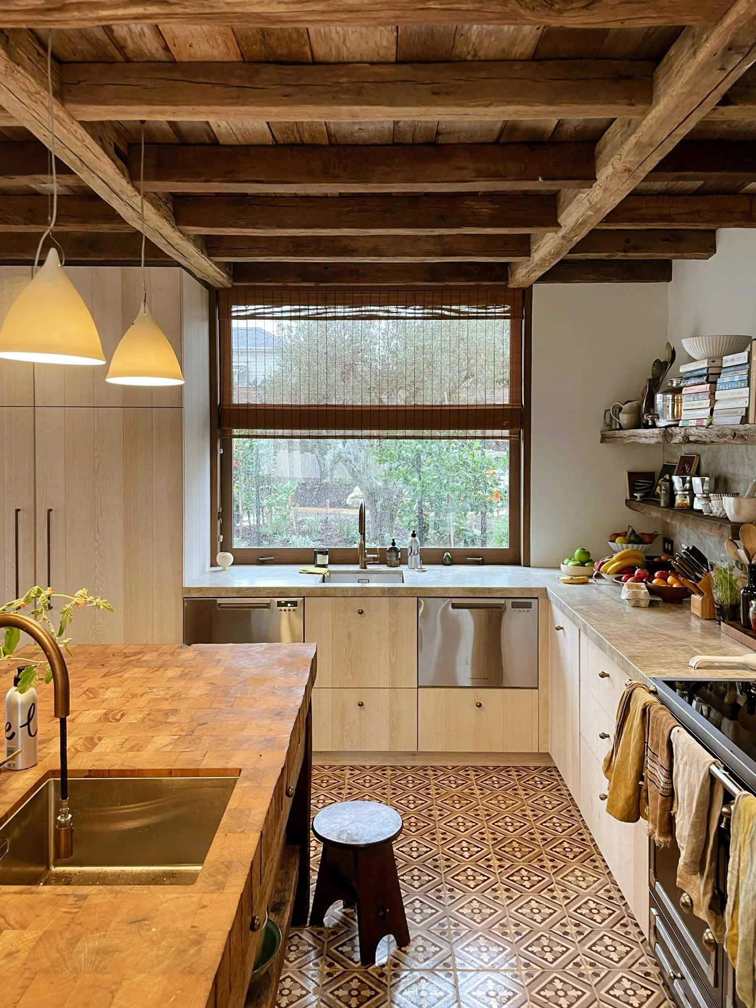 rustic wooden ceiling beams, a wooden island bench