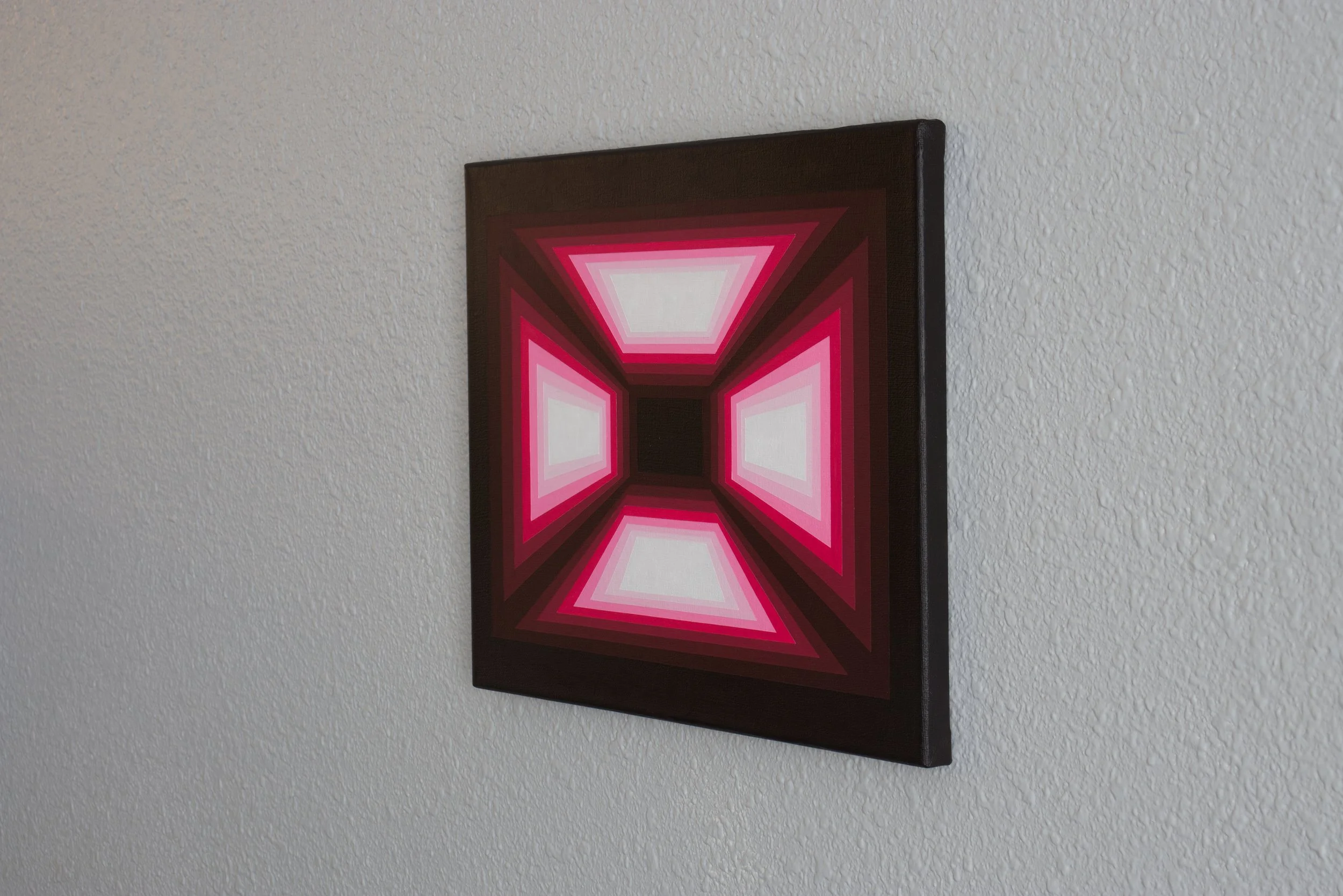 A multi-layered digital-style matrix of intersecting hot pink lines and geometric structures on a dark, high-contrast canvas.JPG