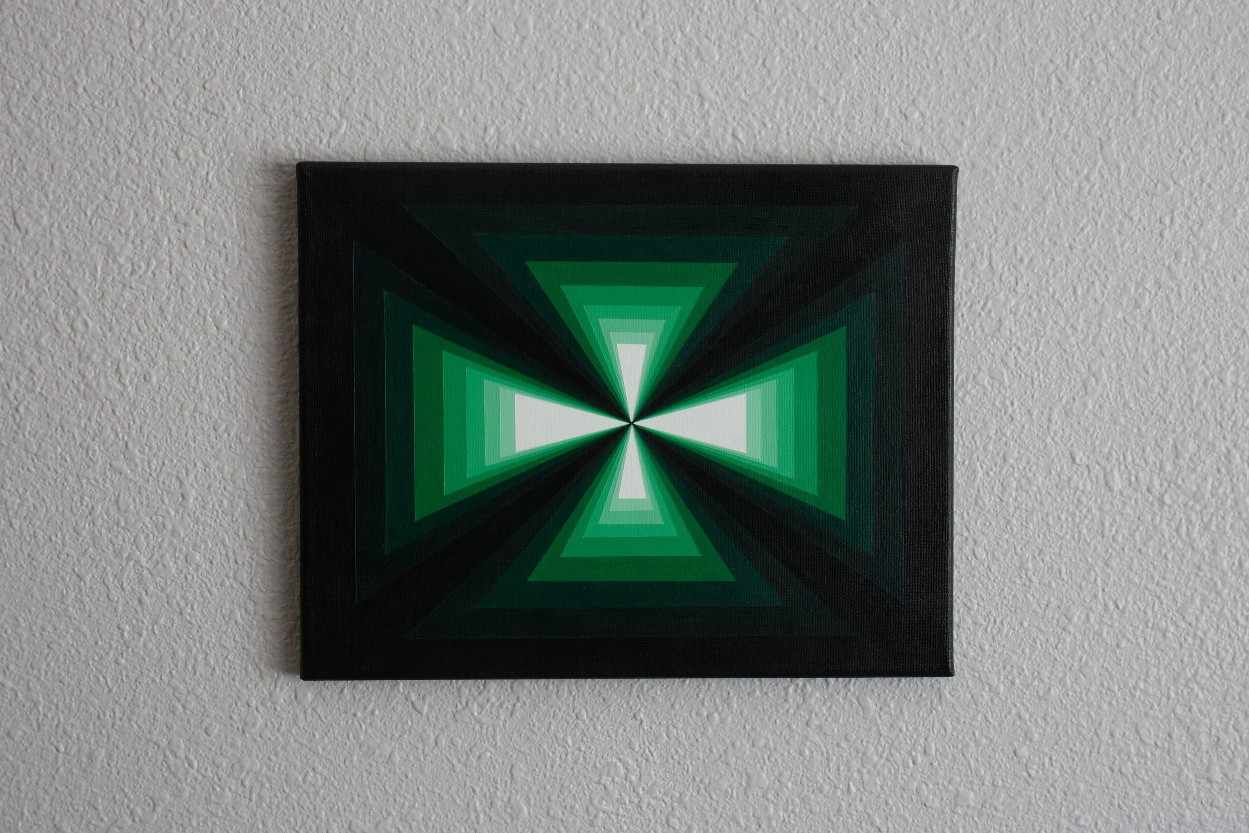 Monochromatic green abstract vortex painting with a gradient shifting from deep dark green borders to a vibrant, luminous center.jpg