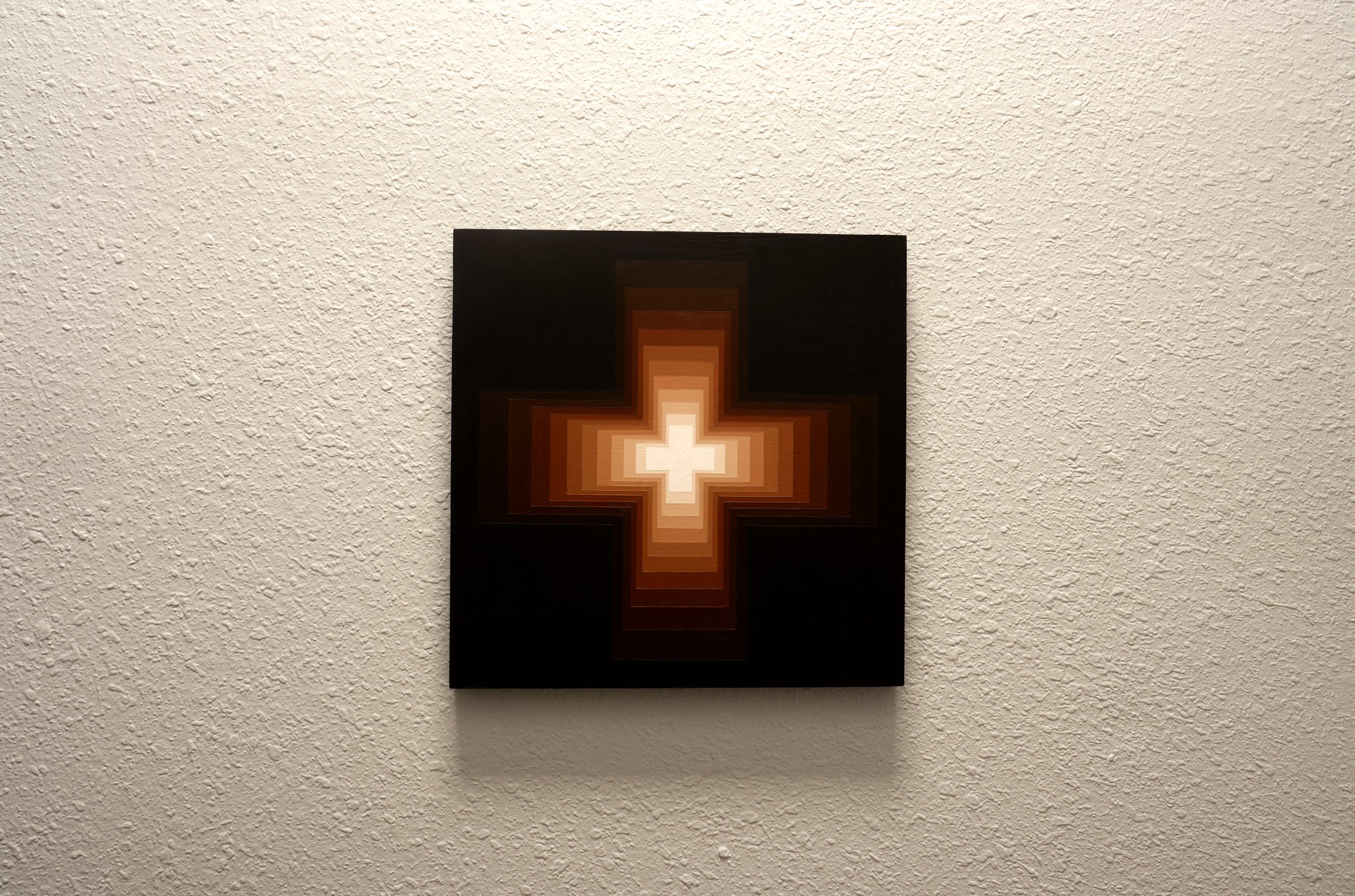 Minimalist earthy red-brown artwork with a precise geometric composition that creates a depth illusion of a central doorway.jpg
