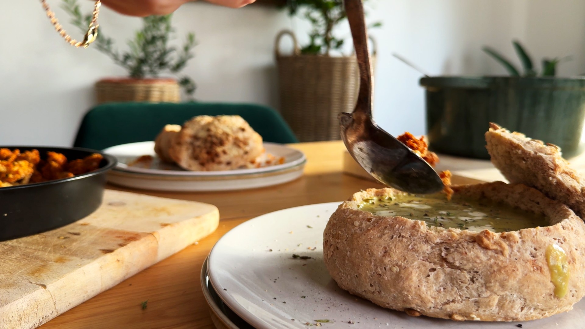 Filling the homemade bread bowl