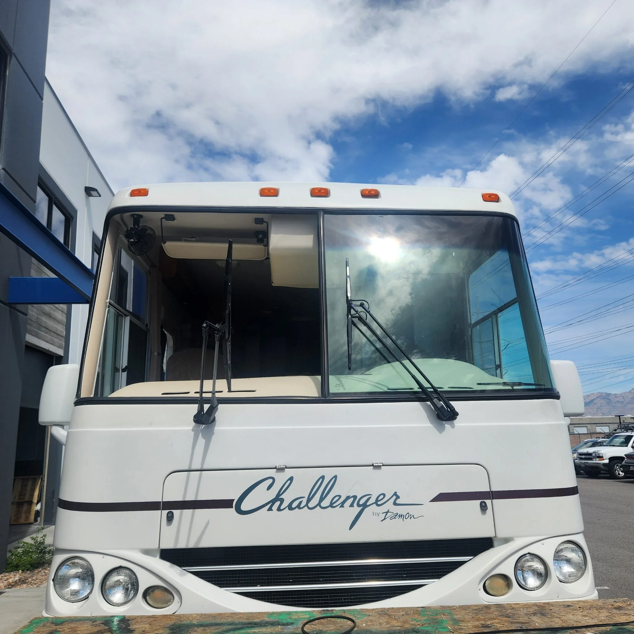 Front view of a Challenger motorhome with its large windshield.jpg
