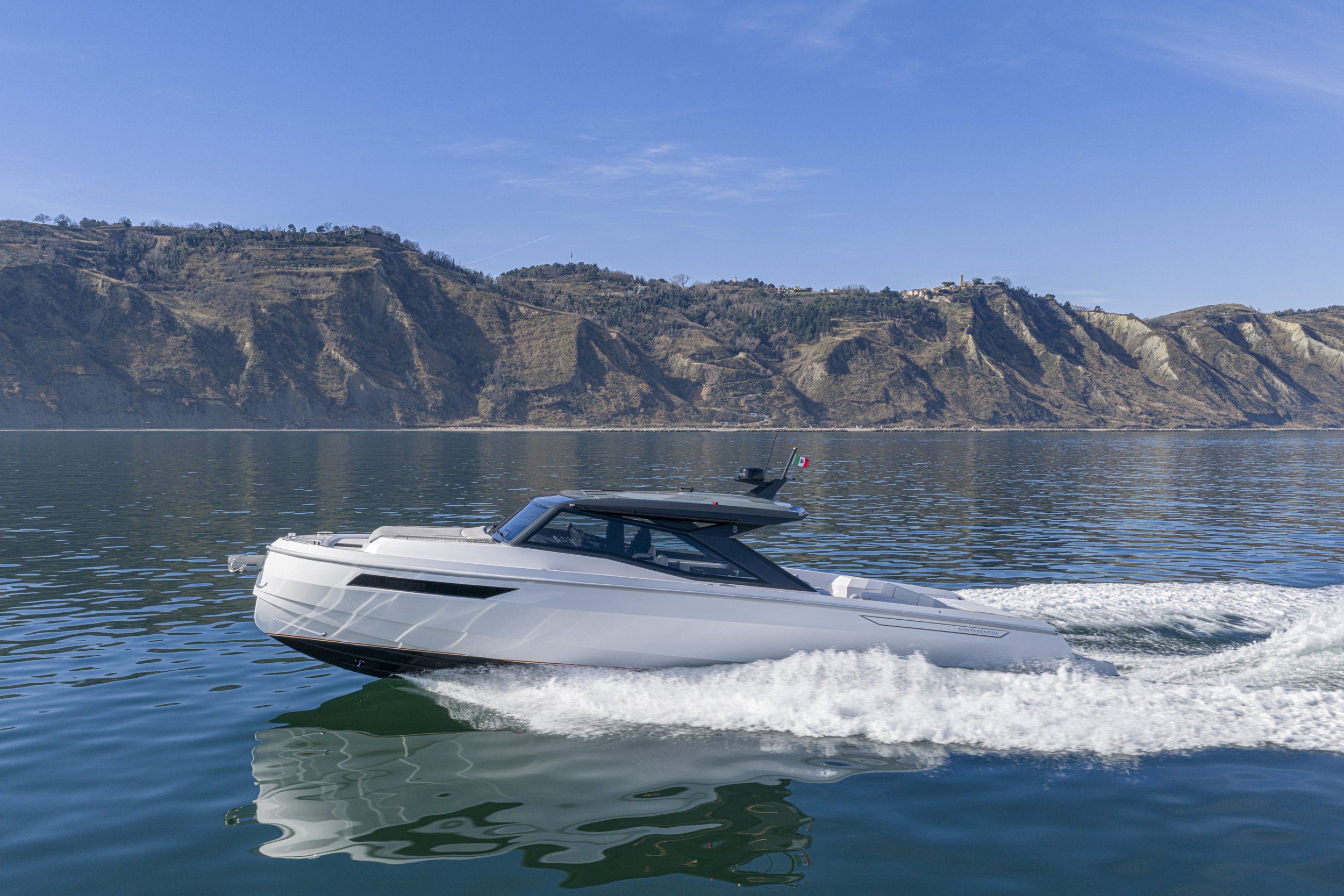 A santasevera yacht motorboat cruising on a calm body of water