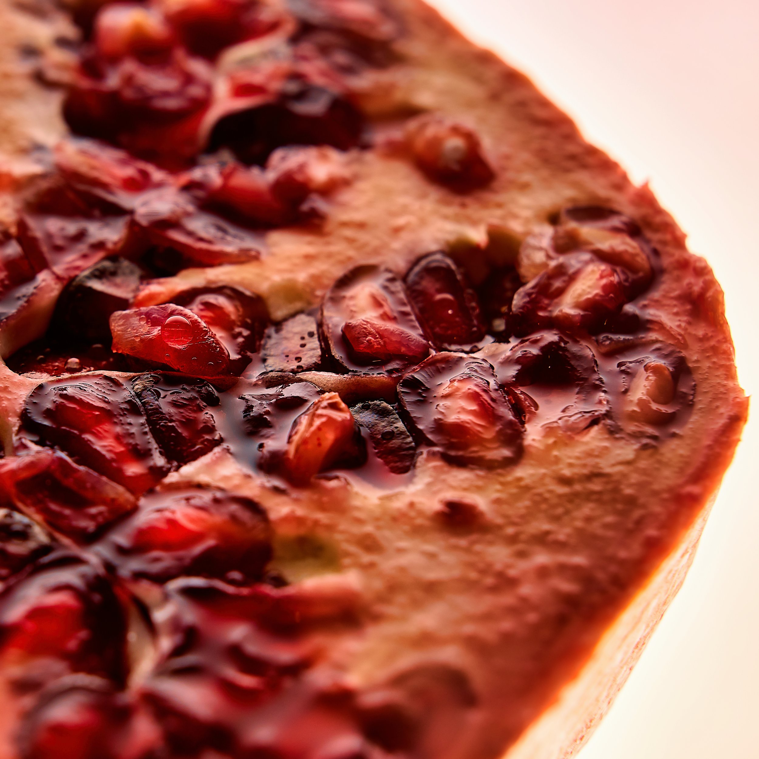 Close-up of a pepperoni pizza with melted cheese and pepperoni slices.