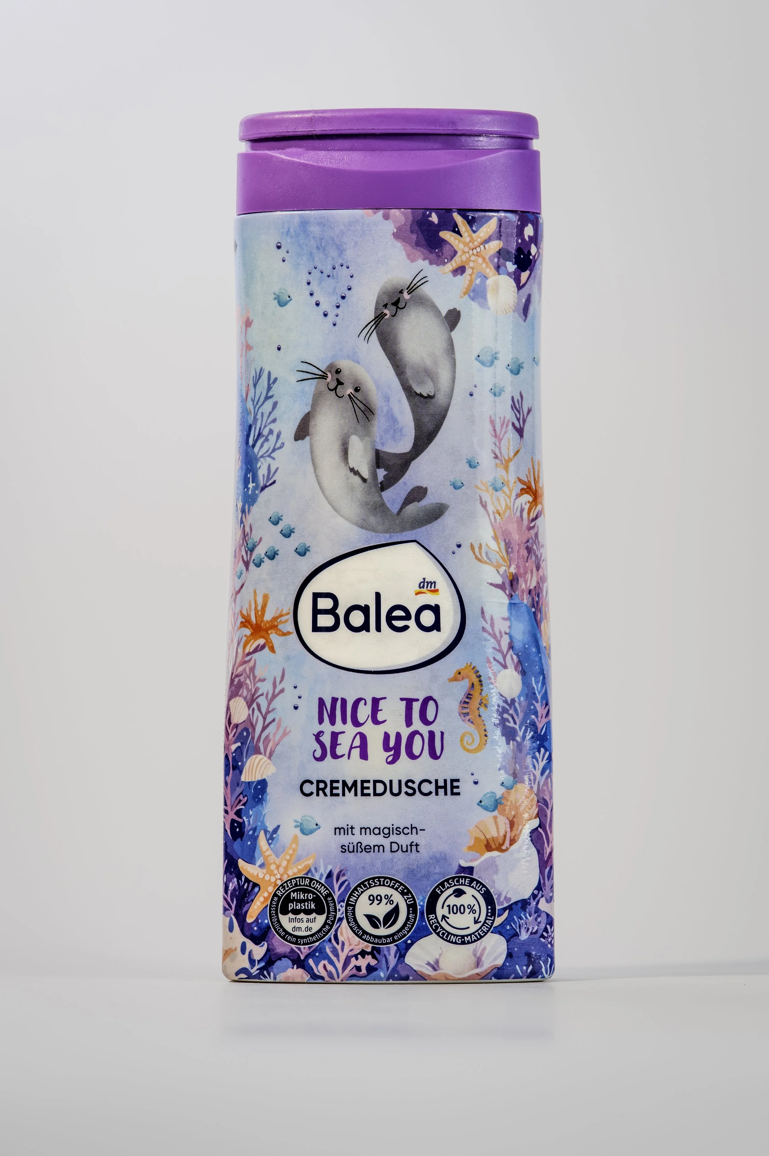 A colorful tube of Balea hand cream with a sea-themed design featuring two otters, starfish, coral, and various small sea creatures on a light background.
