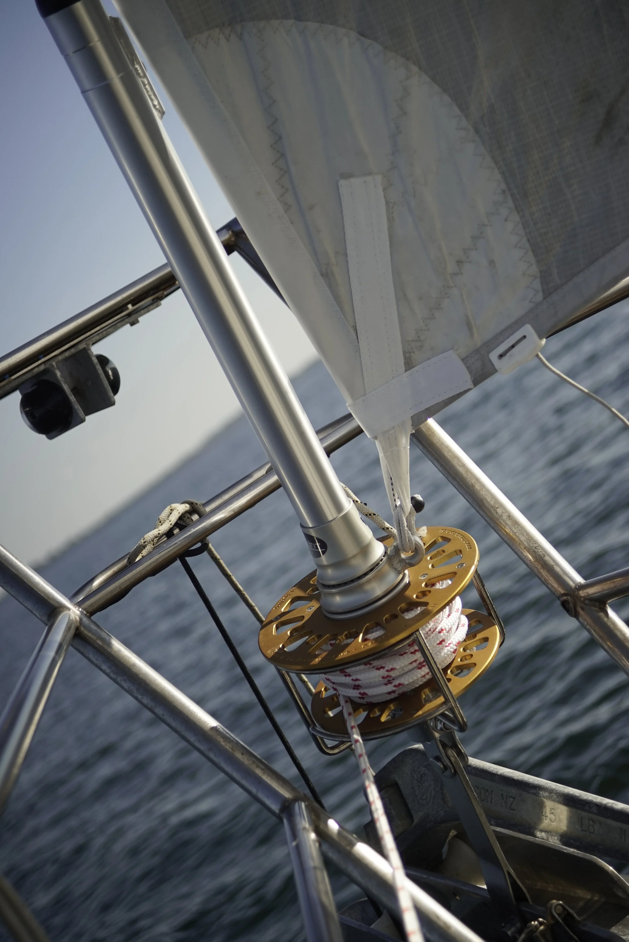 Close-up of a Reefit furling system fitted to a yacht headsail for reliable sail handling.