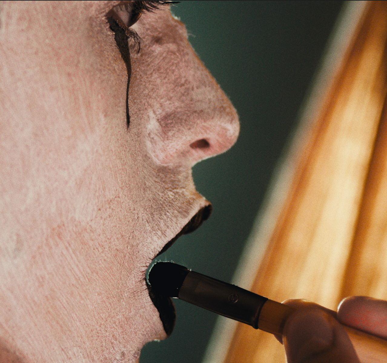 Photo still from a professional and cinematic music video.