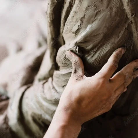 About Hope Scott image of an artist clay sculpting