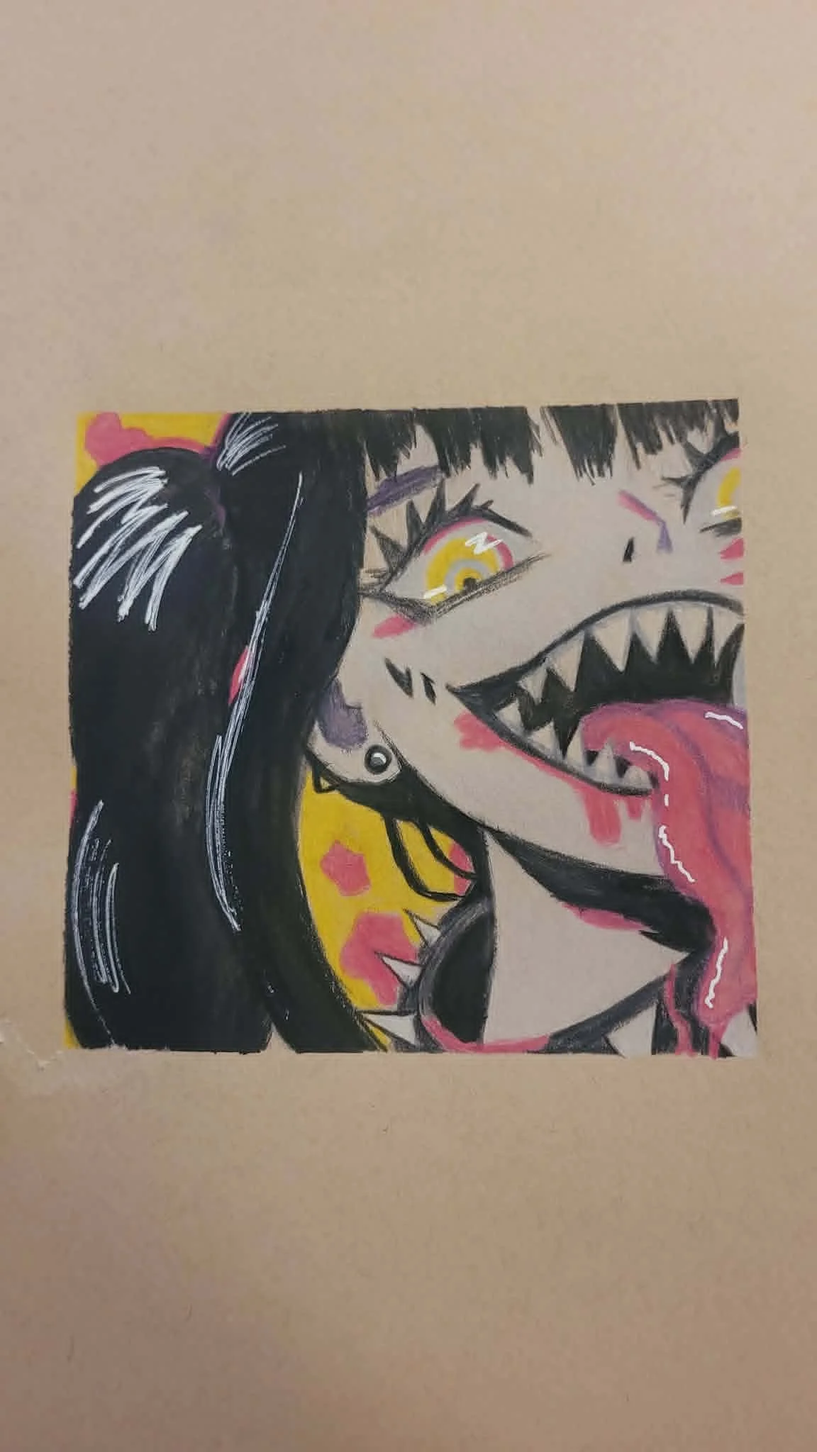 A colorful drawing of a girl with black hair, yellow eyes, and sharp teeth, sticking out her tongue.