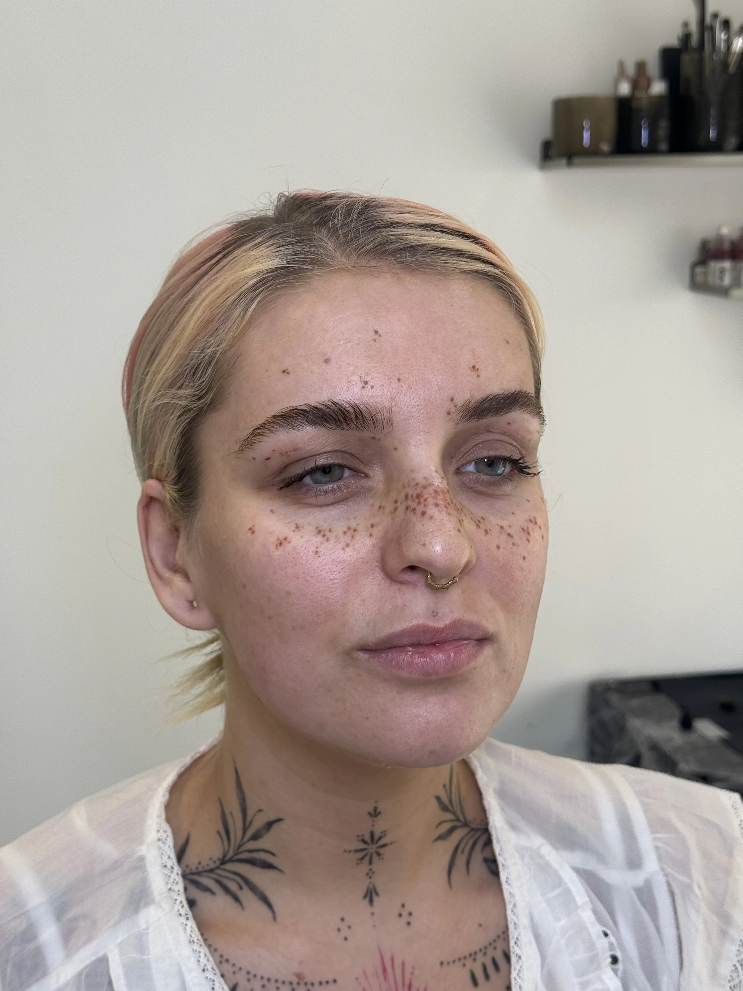 Medium coverage faux freckle tattoos