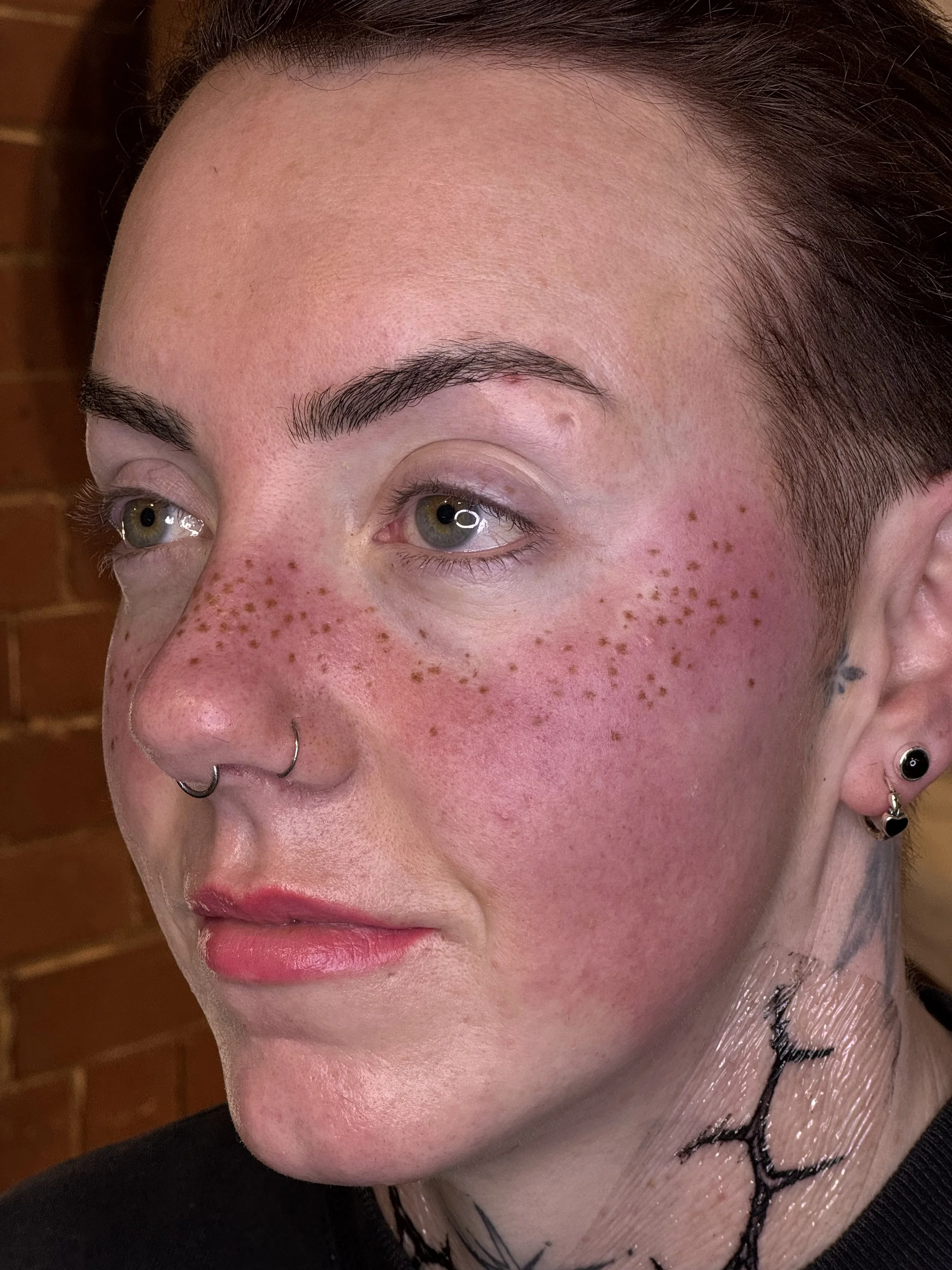 Medium coverage faux freckle tattoos