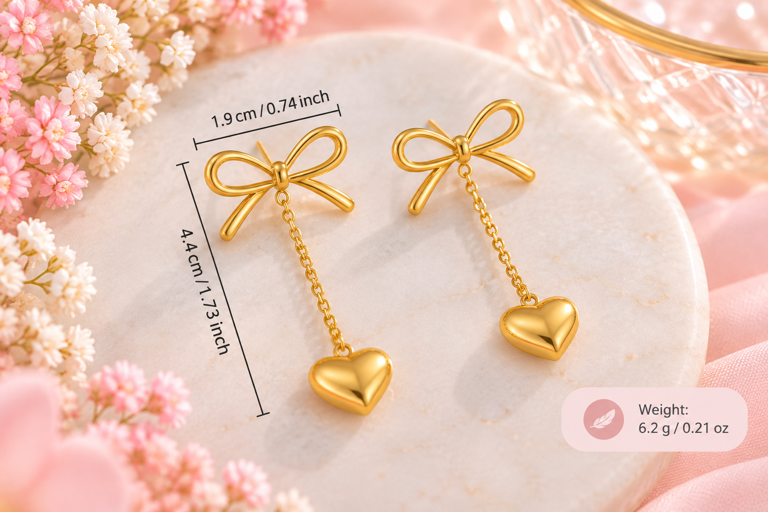 Gold Bow and Heart Earring Details.png