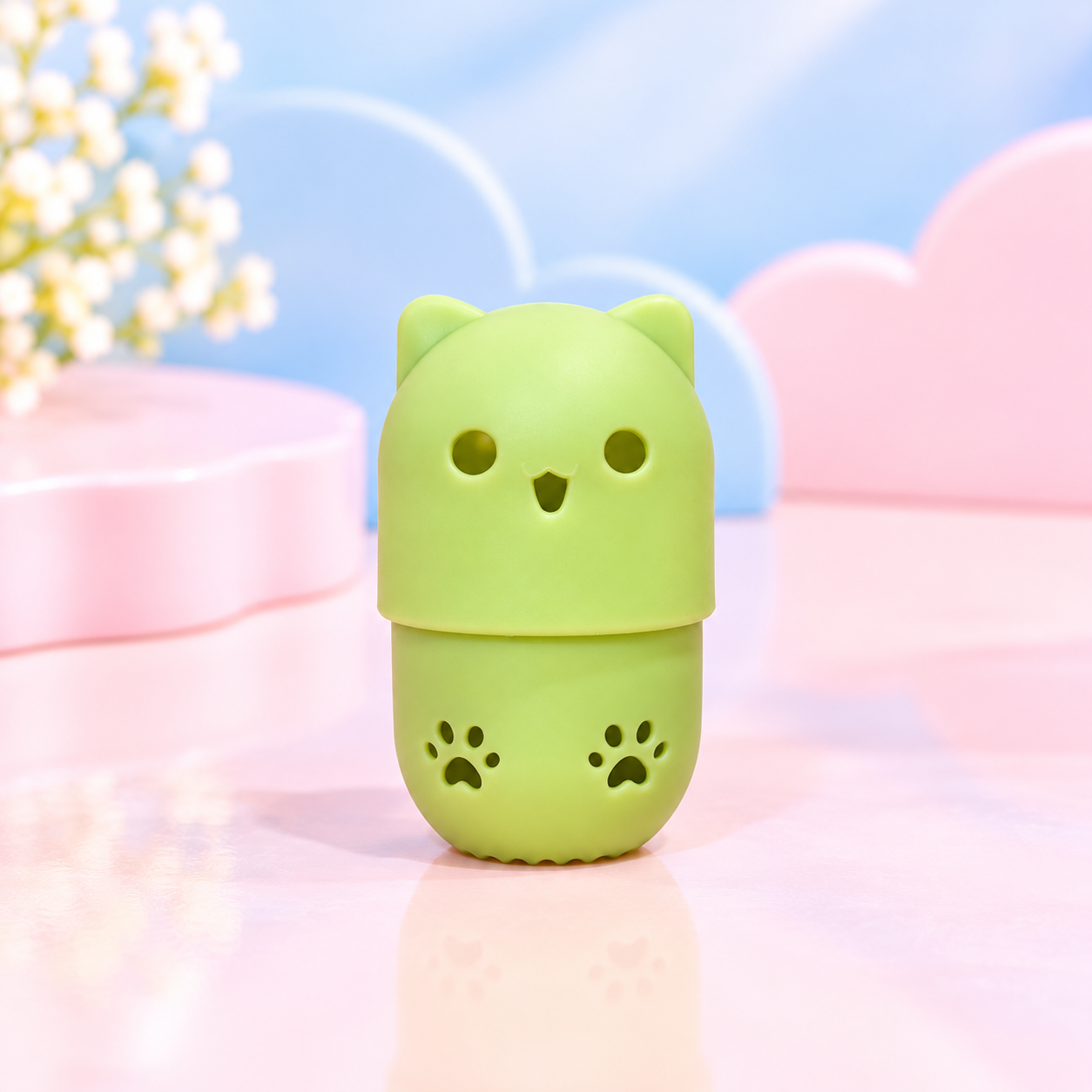 Kawaii Green Cat Capsule on Pastel Tabletop.png