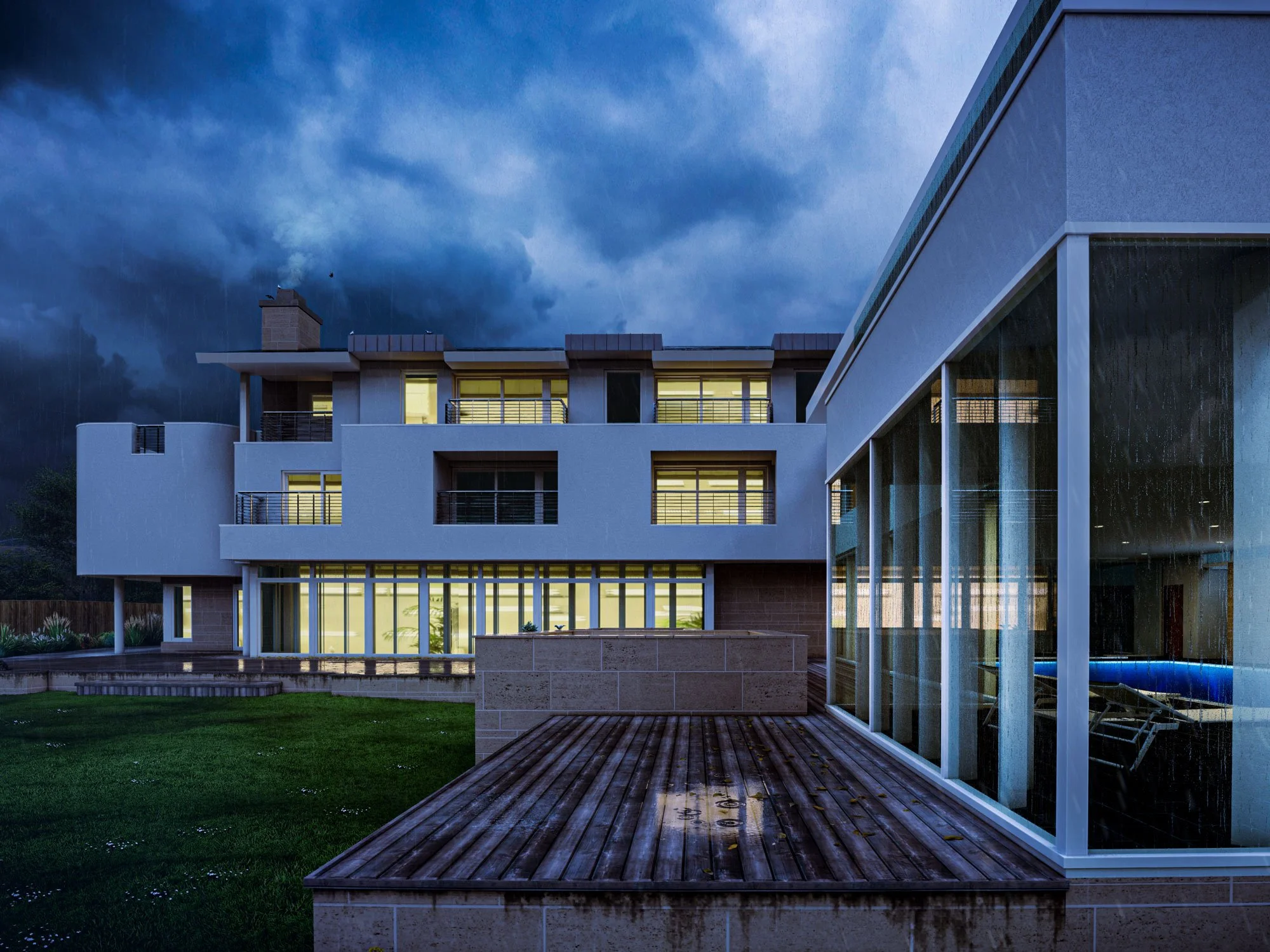Modern residential building with large windows and a wooden deck, outdoor lawn, and cloudy sky at dusk.