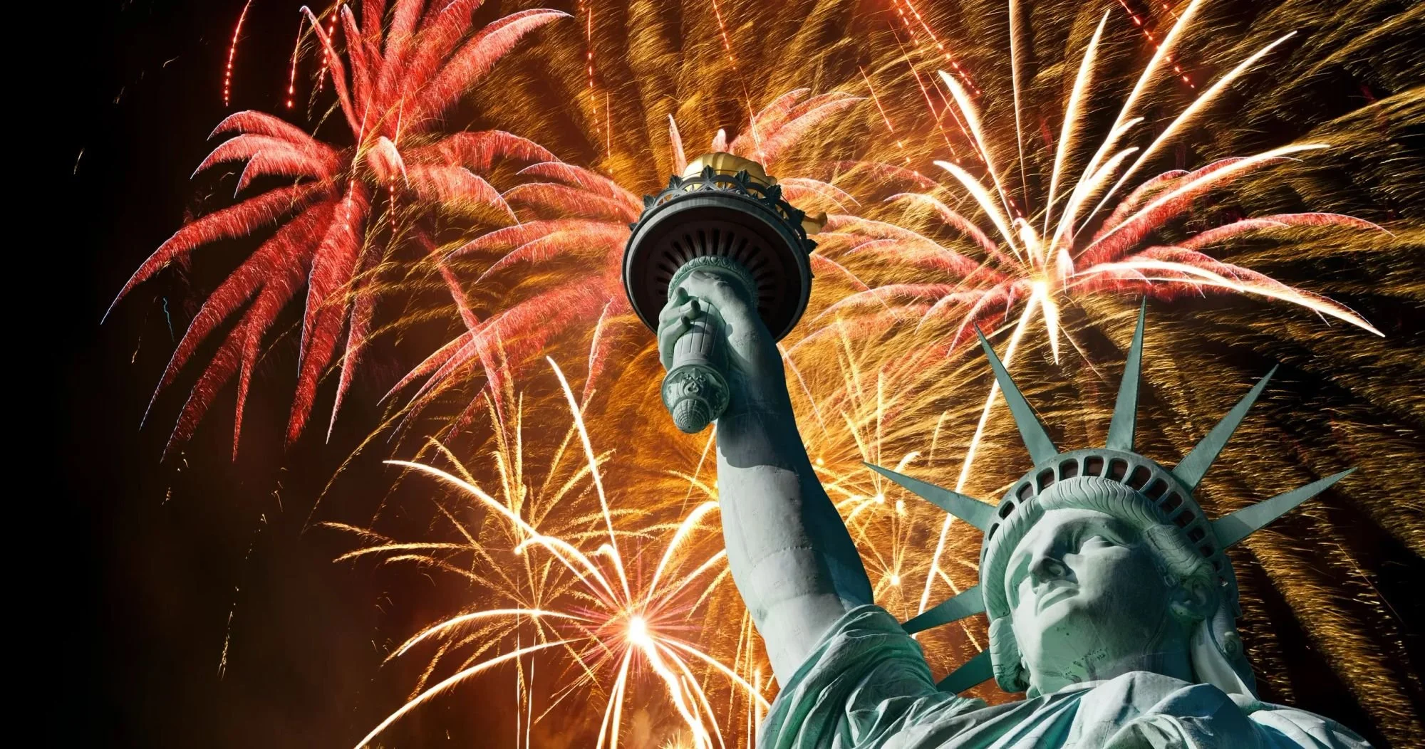 July 4th fireworks over New York City and Statue of Liberty