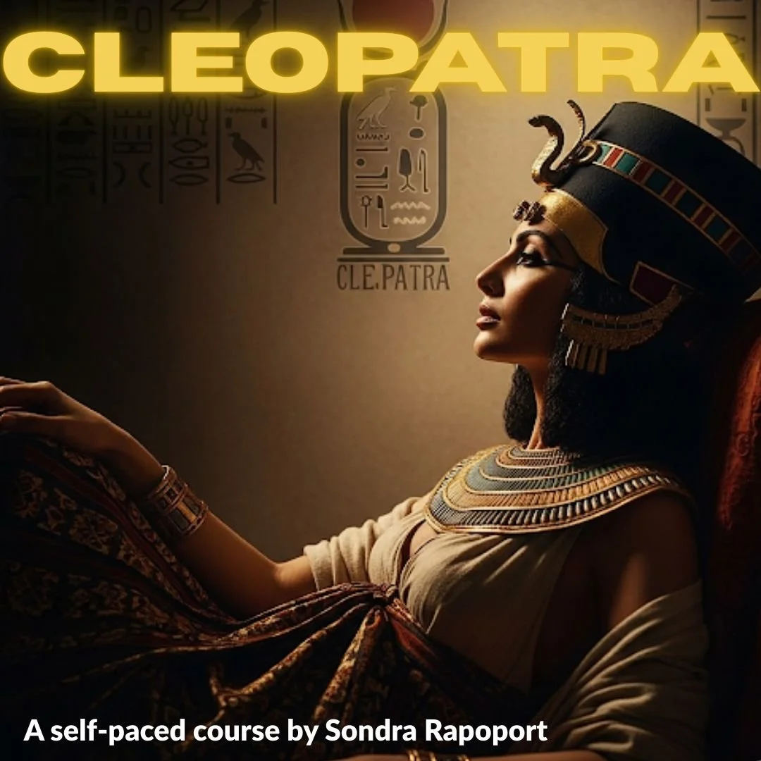 Book cover featuring a woman dressed as an ancient Egyptian queen wearing a headdress with gold and colorful details, sitting in profile with a side view of her face and neck, with Egyptian hieroglyphs and the title "Cleopatra" in large yellow letters.