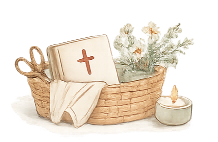 A wicker basket holding a Bible with a cross on the cover and a cloth draped over the side, white artificial flowers, and a small candle in a white container with a flame.