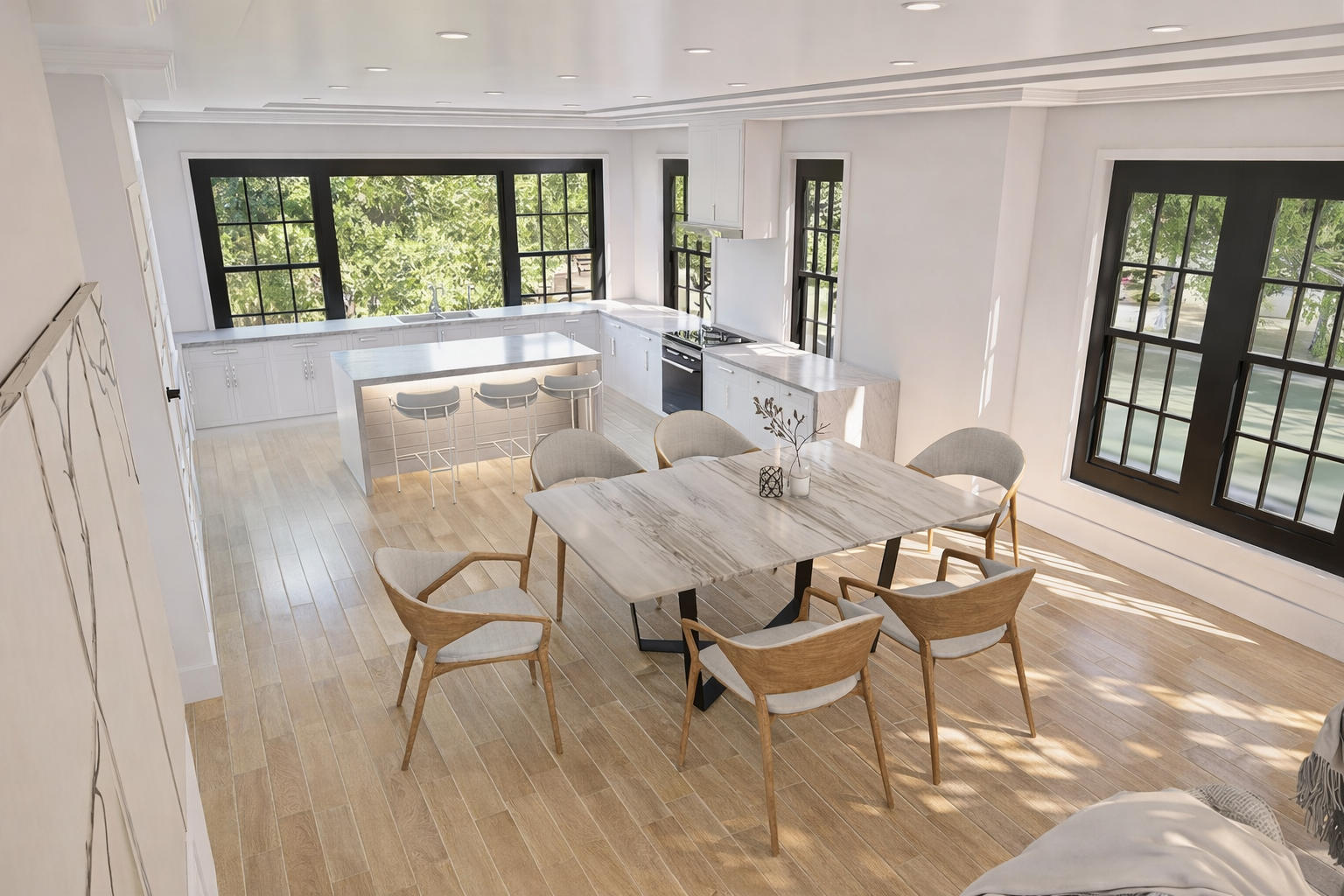 Bright, modern kitchen with large windows, white cabinets, marble island, light wood flooring, and a dining area with a marble table and beige chairs.