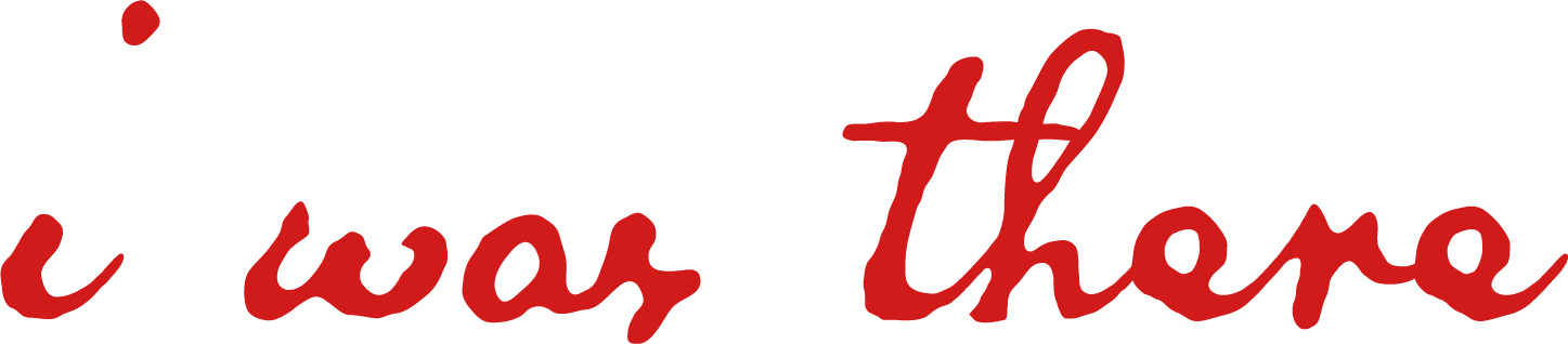 Text saying 'I was there' in red cursive font on a white background.